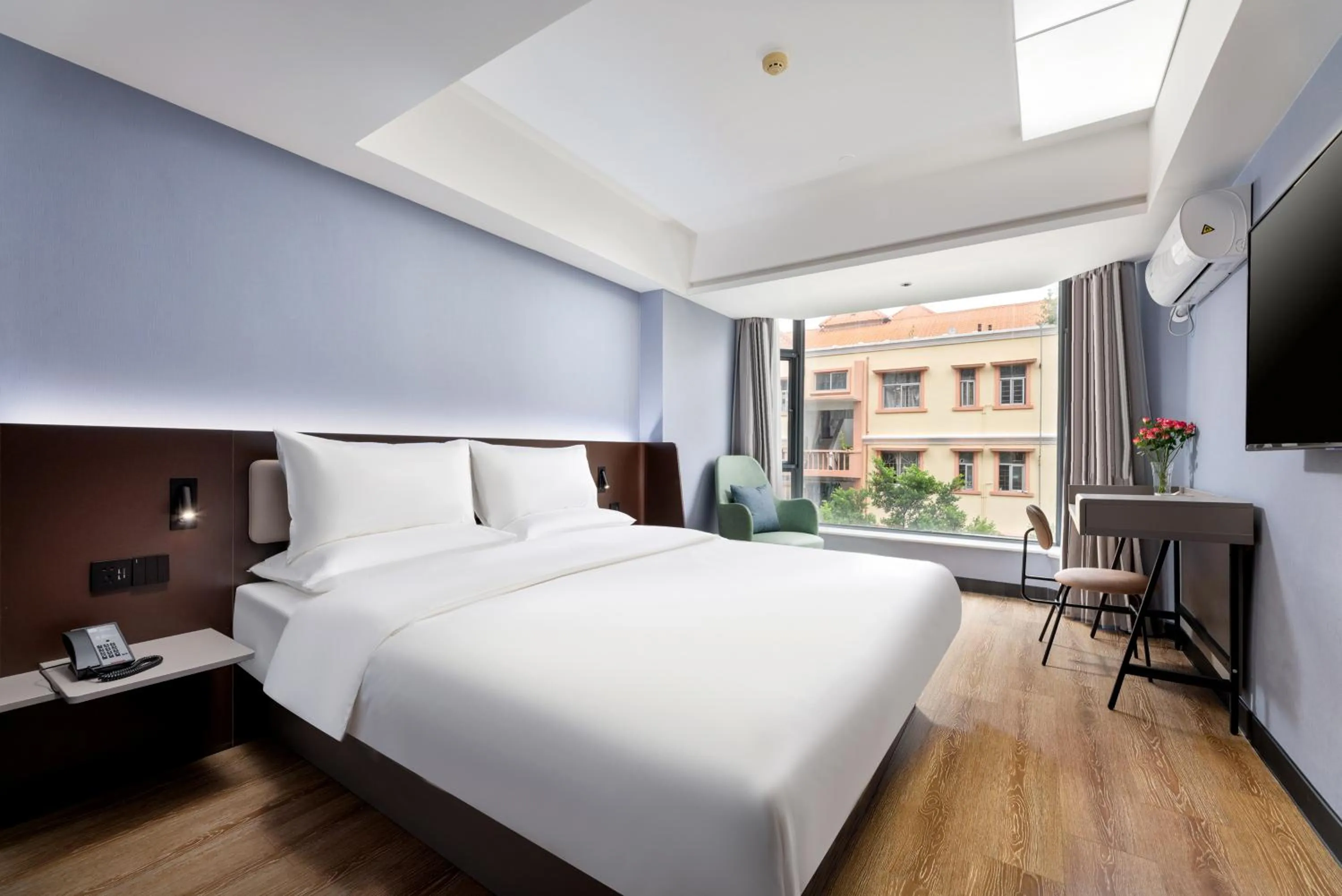 Bed in Hanting Hotel Guangzhou Sanyuanli