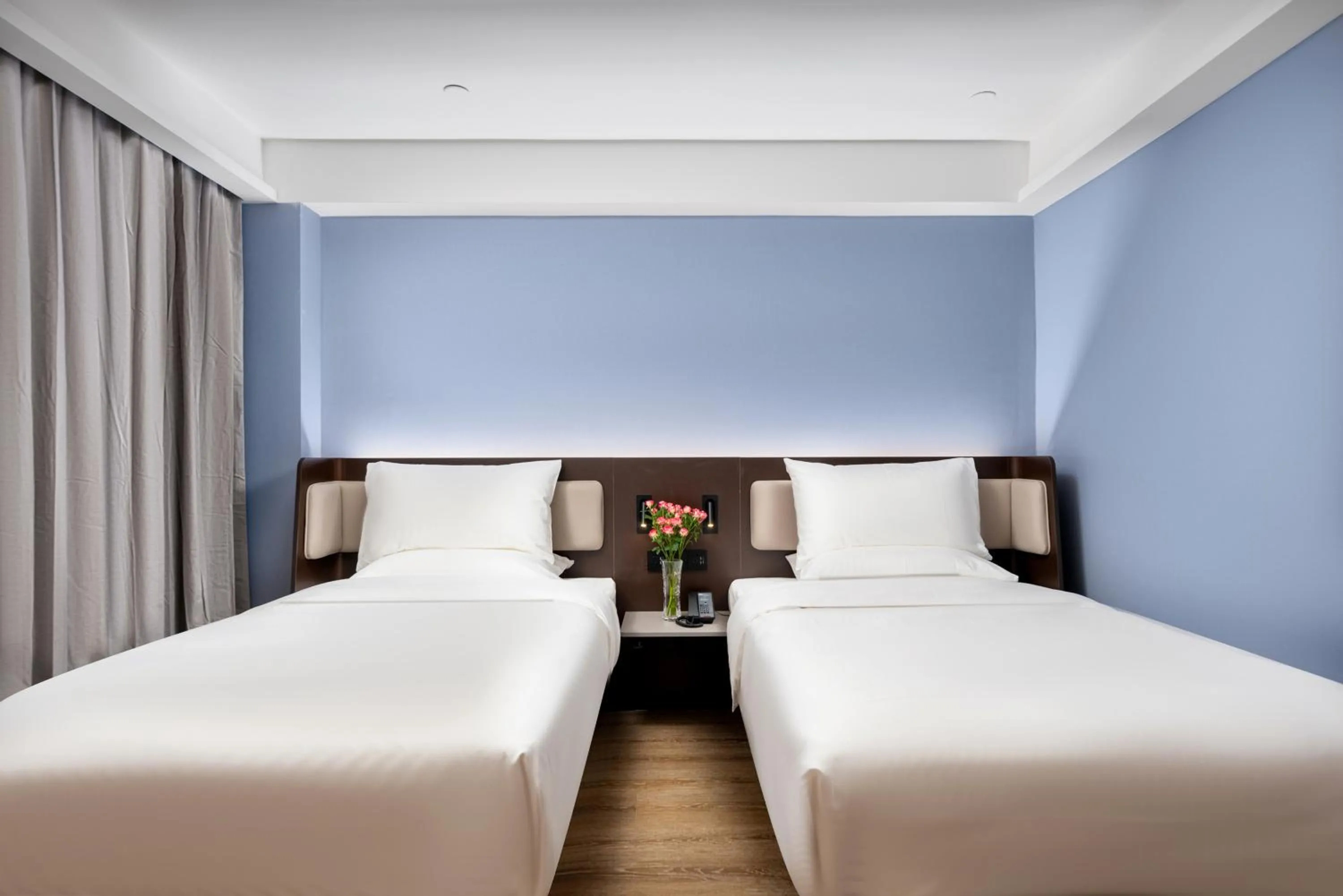 Bed in Hanting Hotel Guangzhou Sanyuanli