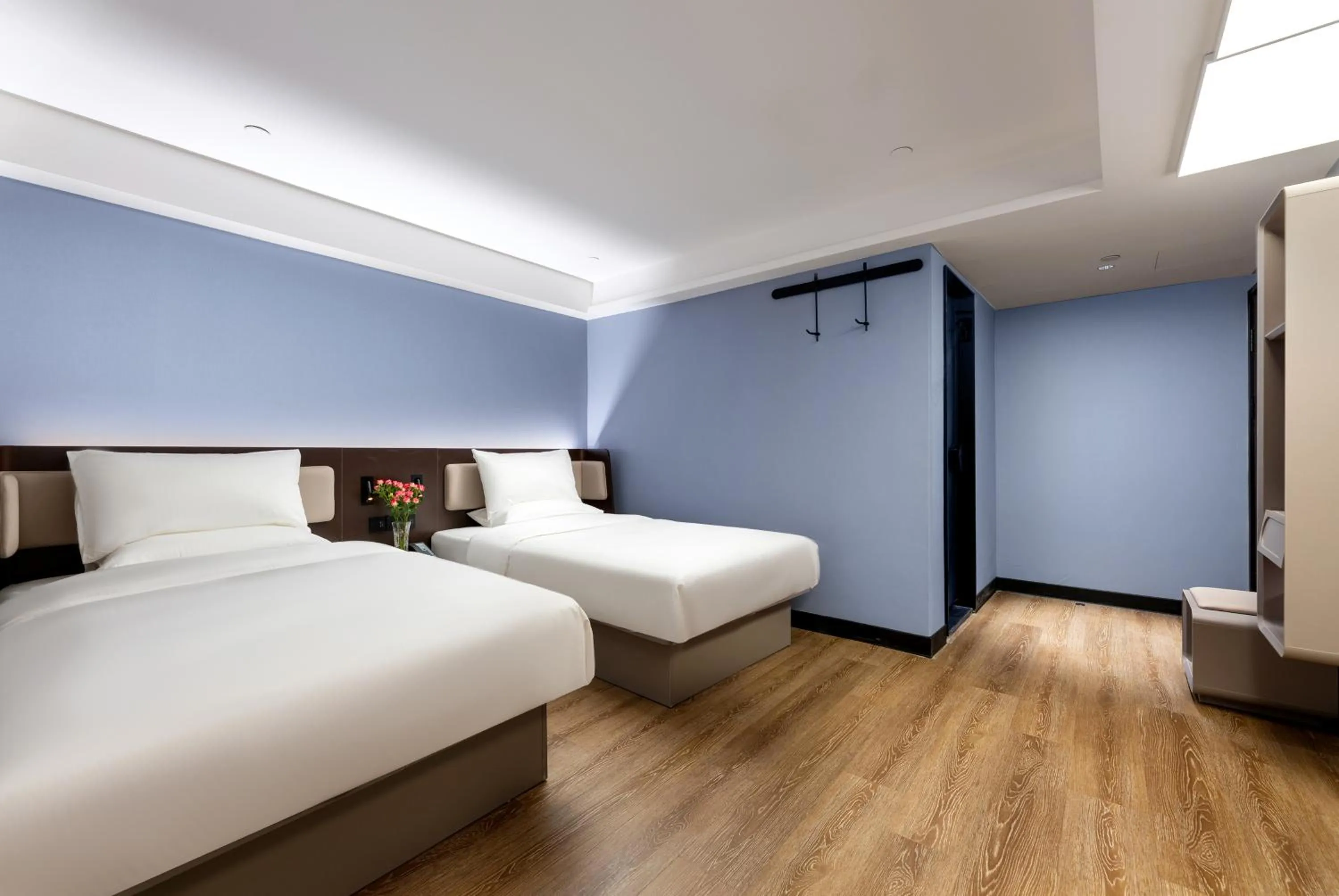 Bed in Hanting Hotel Guangzhou Sanyuanli
