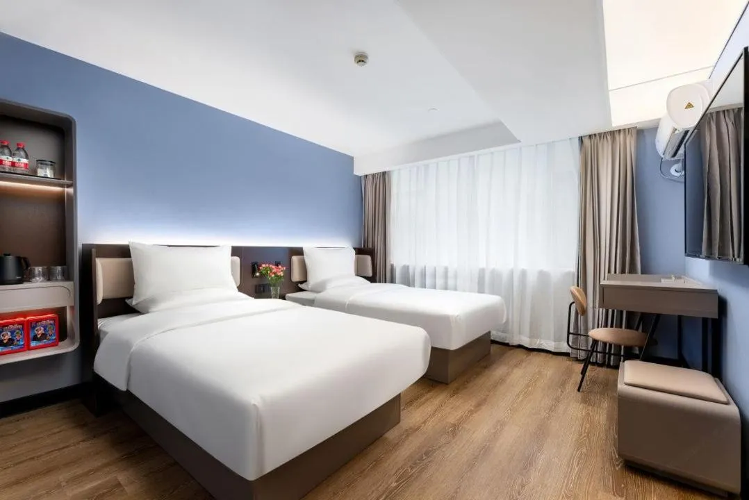Bed in Hanting Hotel Guangzhou Sanyuanli