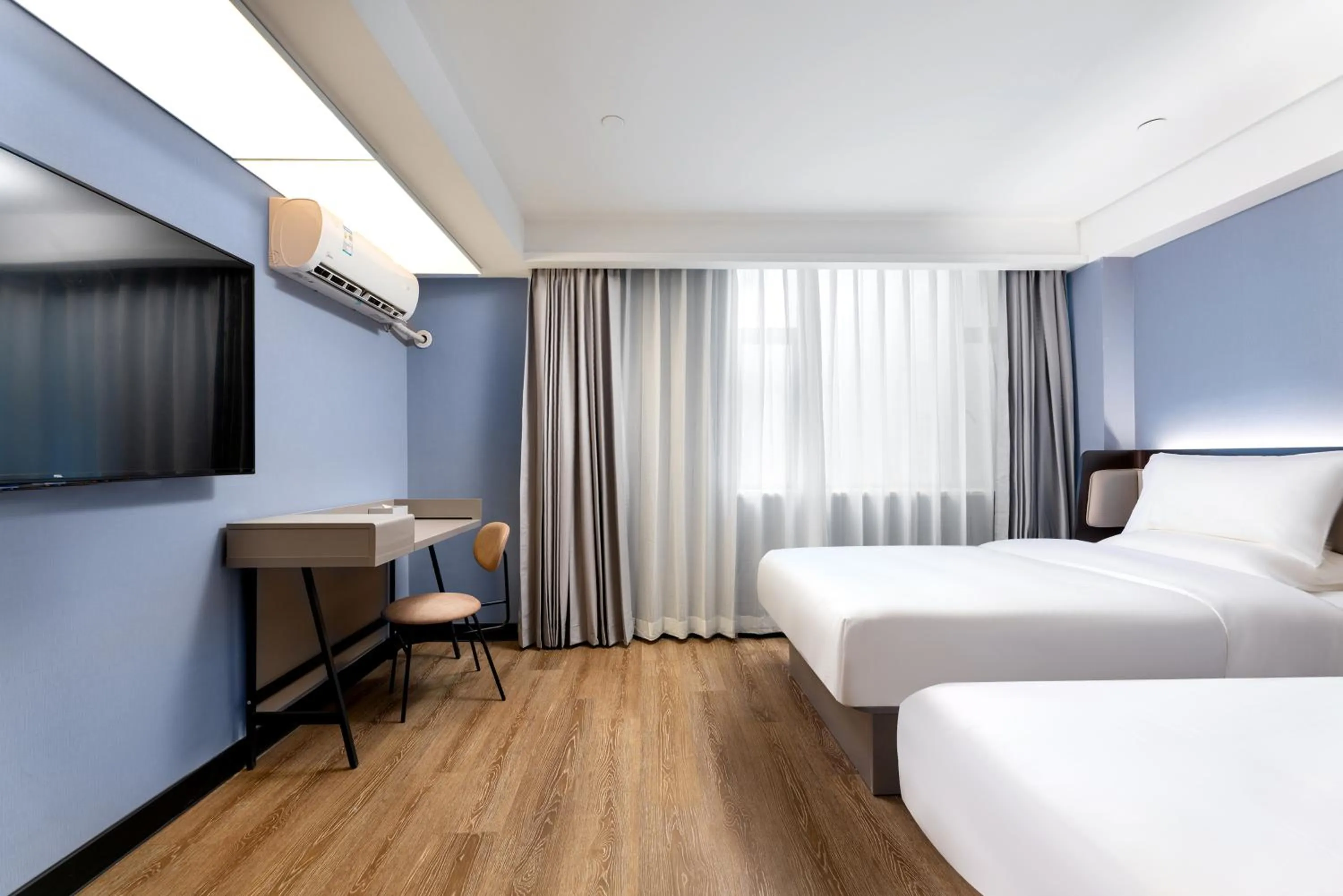 Bed in Hanting Hotel Guangzhou Sanyuanli