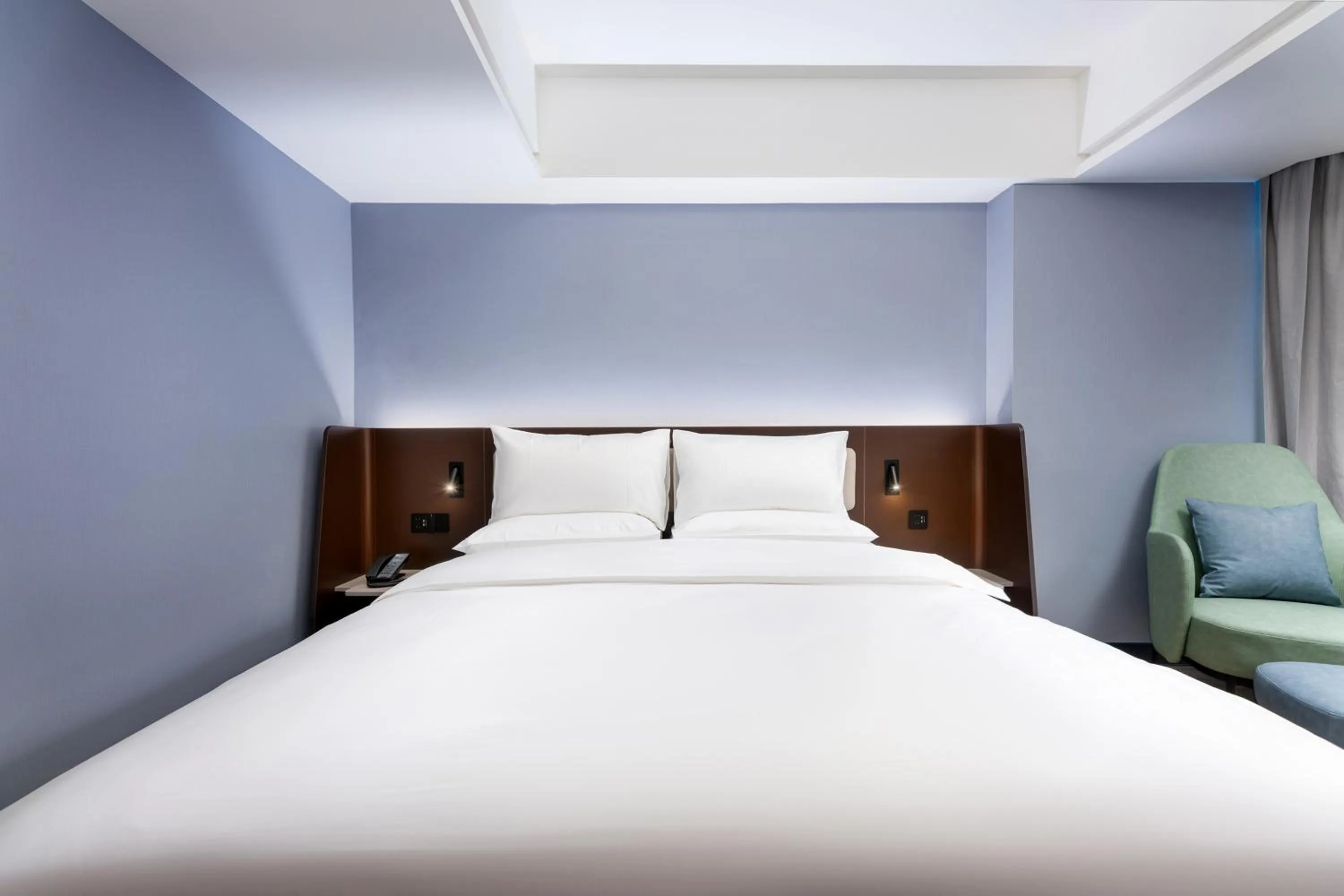 Bed in Hanting Hotel Guangzhou Sanyuanli