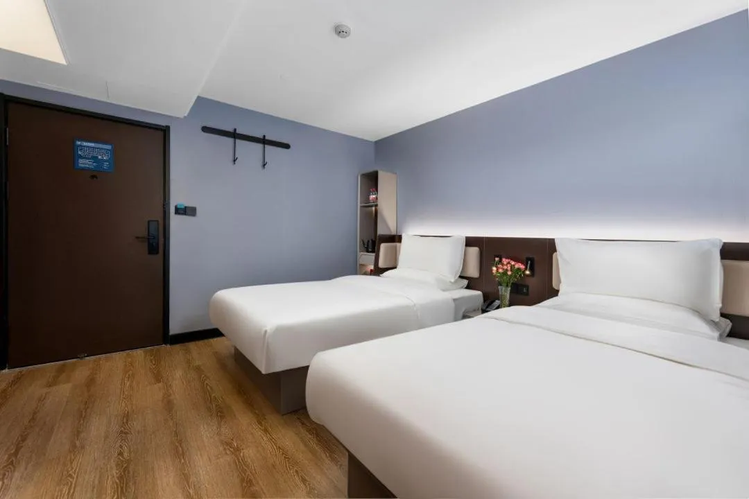 Bed in Hanting Hotel Guangzhou Sanyuanli