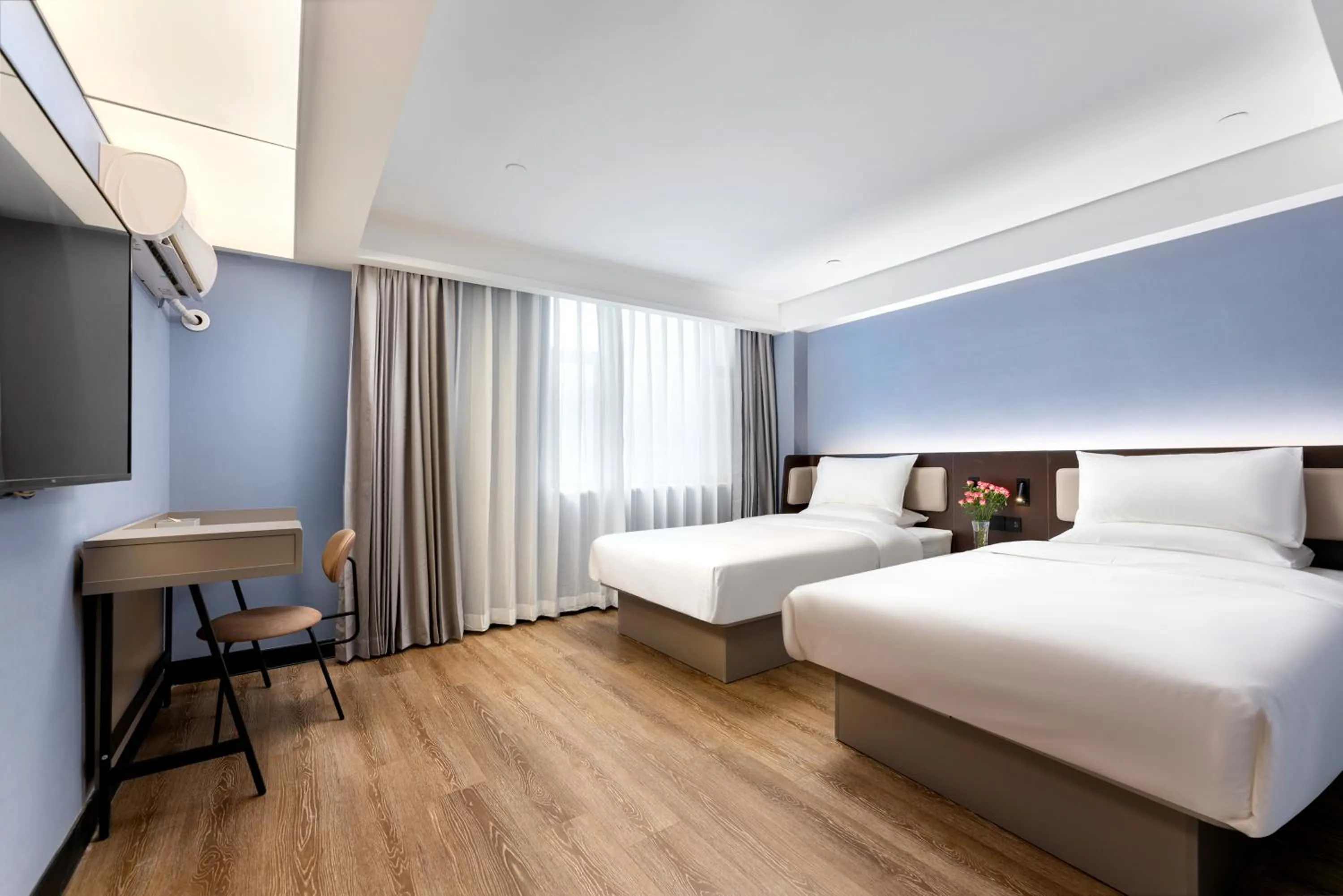 Bed in Hanting Hotel Guangzhou Sanyuanli