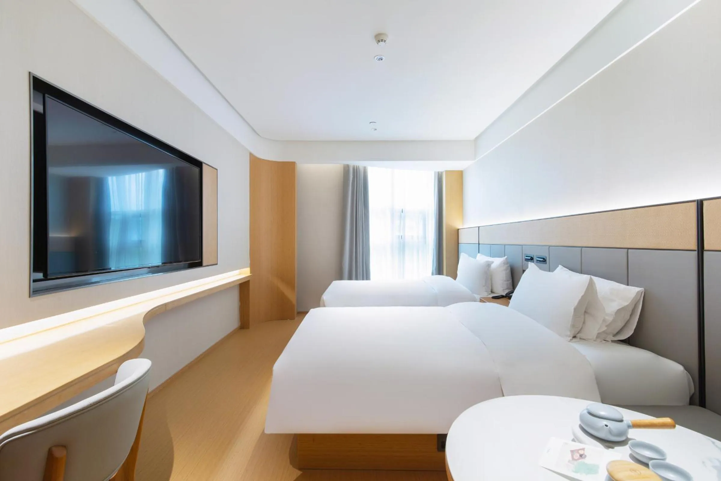 Photo of the whole room, Bed in JI Hotel Nanjing Baijia Lake 1912