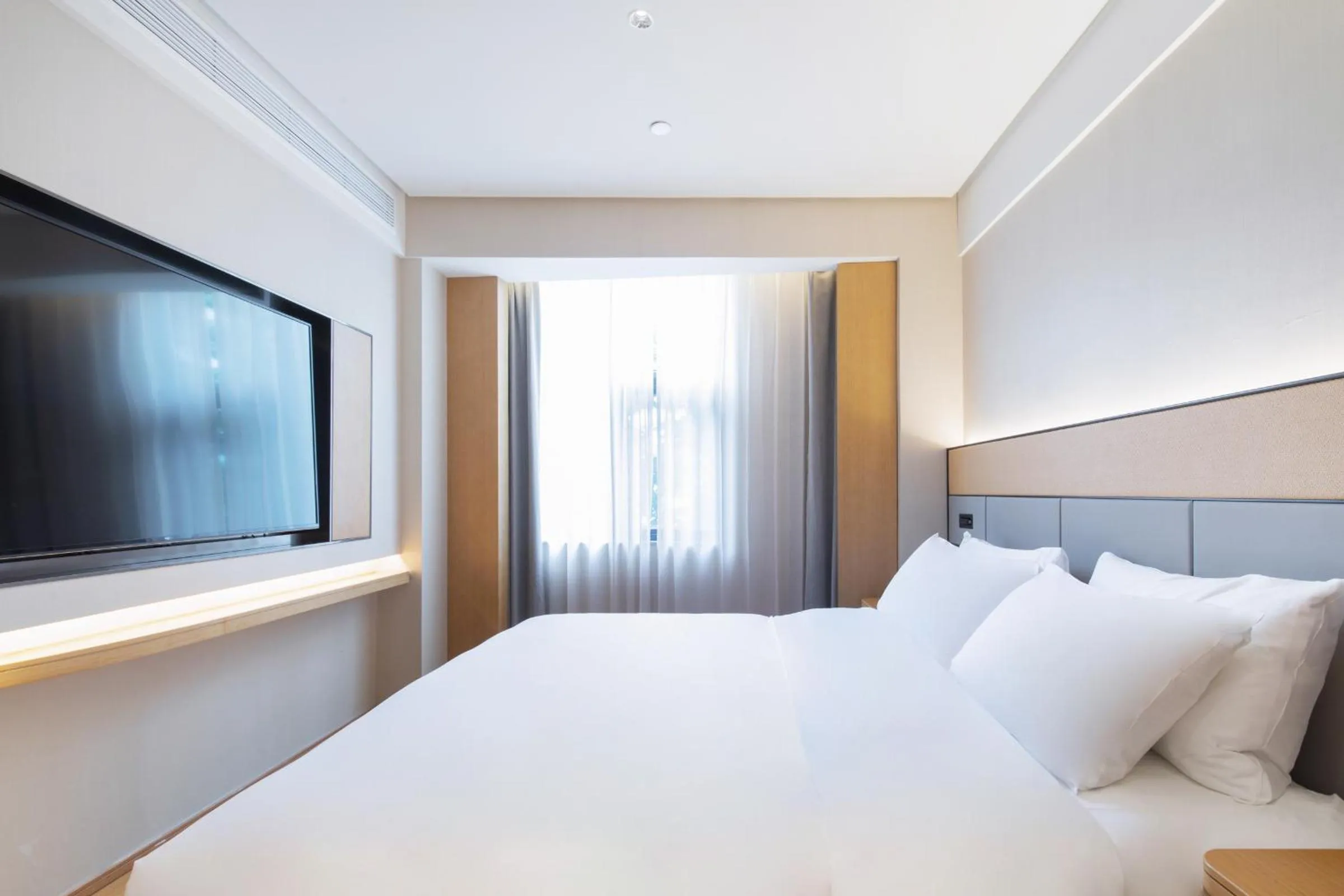 Bed in JI Hotel Nanjing Baijia Lake 1912