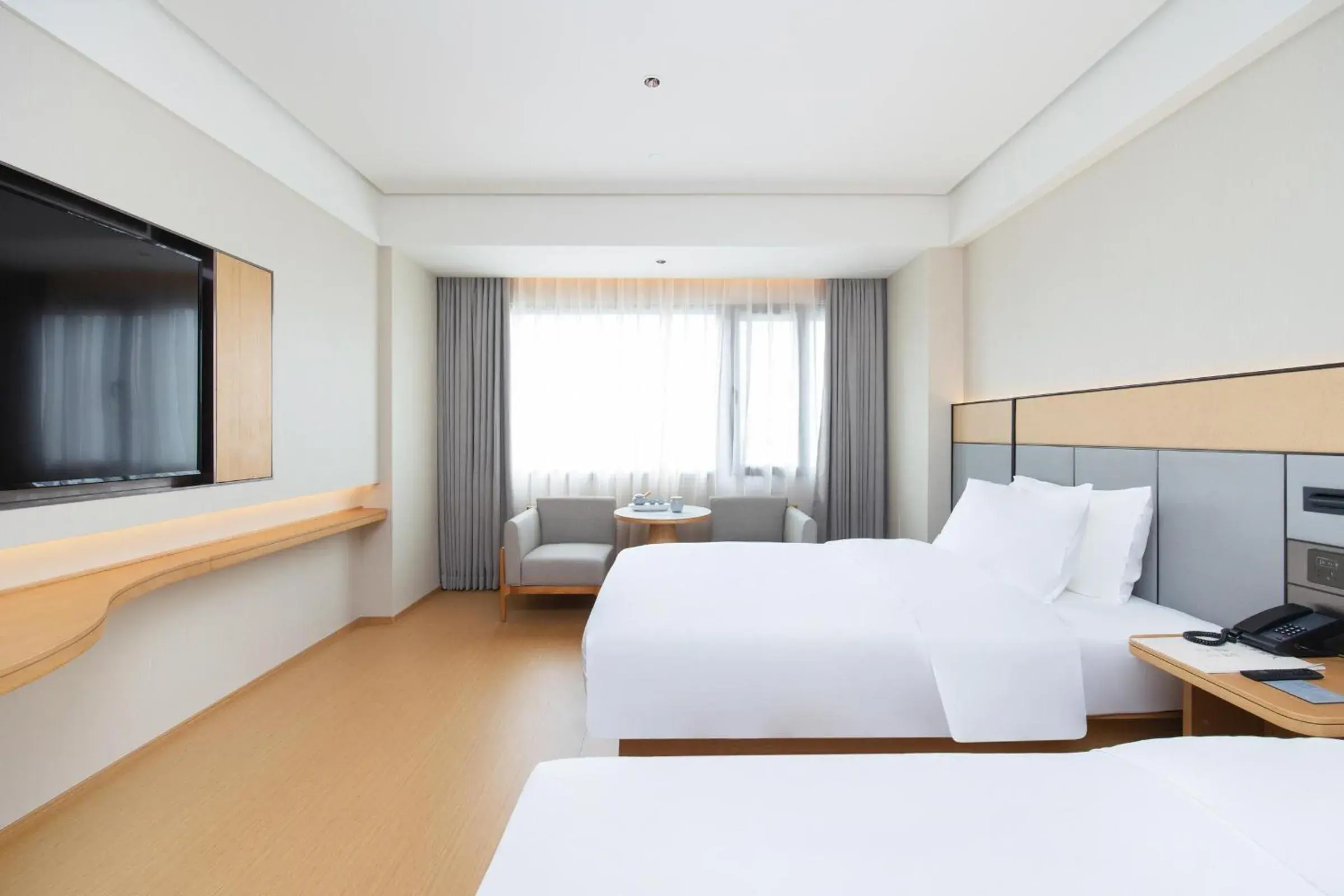 Bed in JI Hotel Shenzhen Huaqiang North Huaqiang Road Subway Station Bed in JI Hotel Shenzhen Huaqiang North Huaqiang Road Subway Station