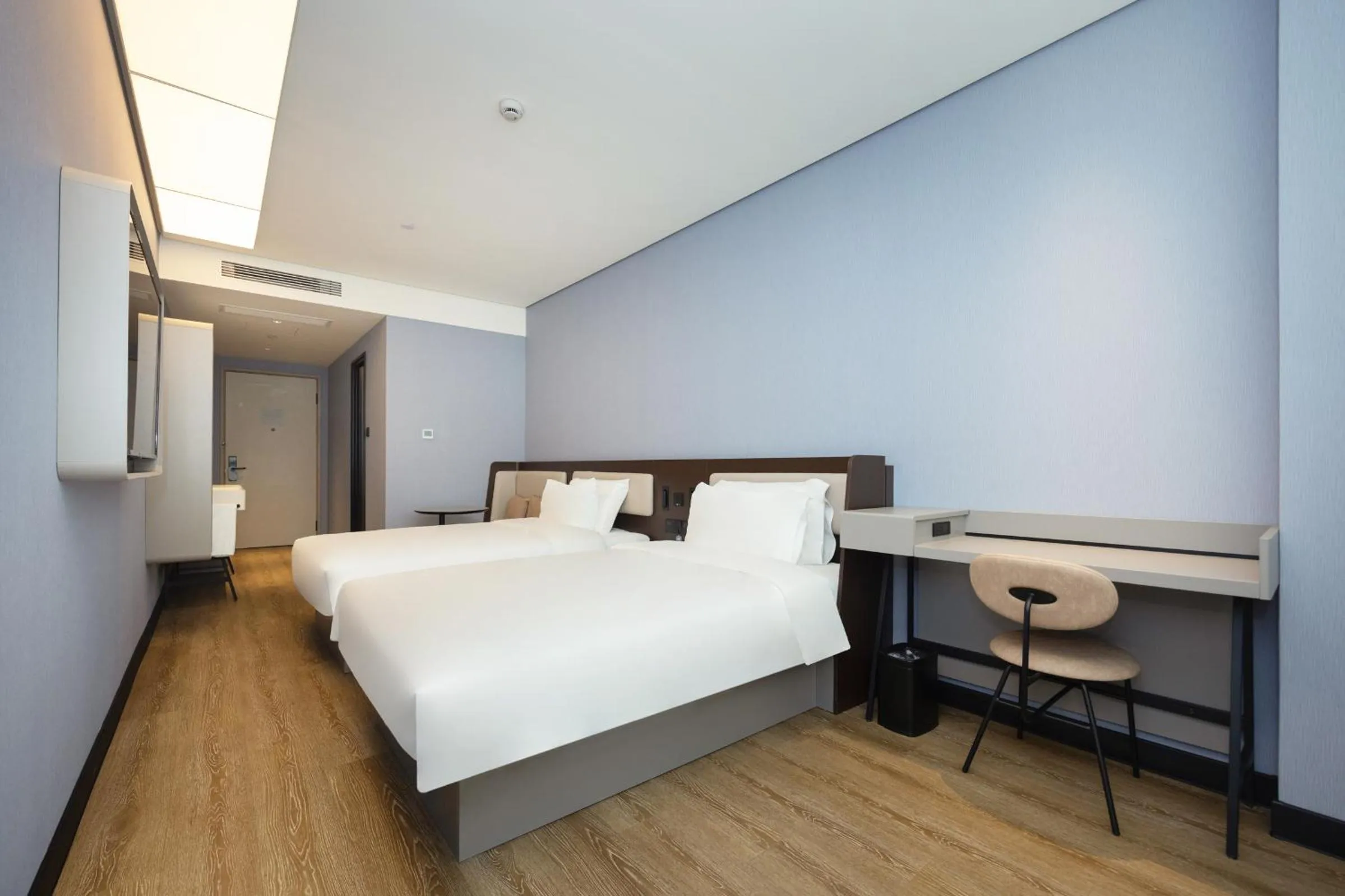 Bed in Hanting Hotel Shanghai Yishan Road Center