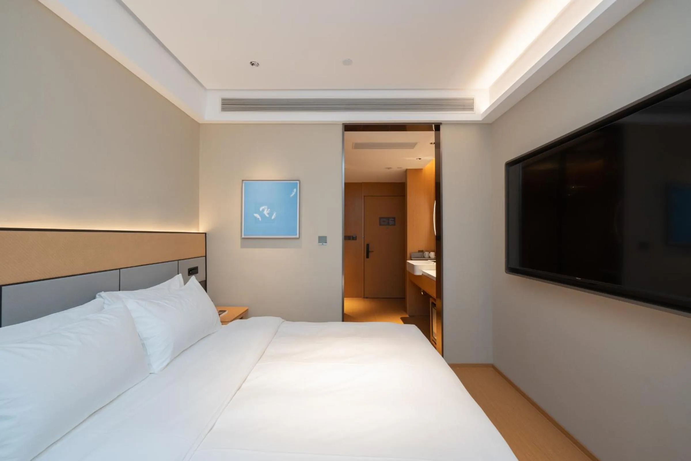 Bed in JI Hotel Guangzhou Panyu Chimelong Wanbo Center