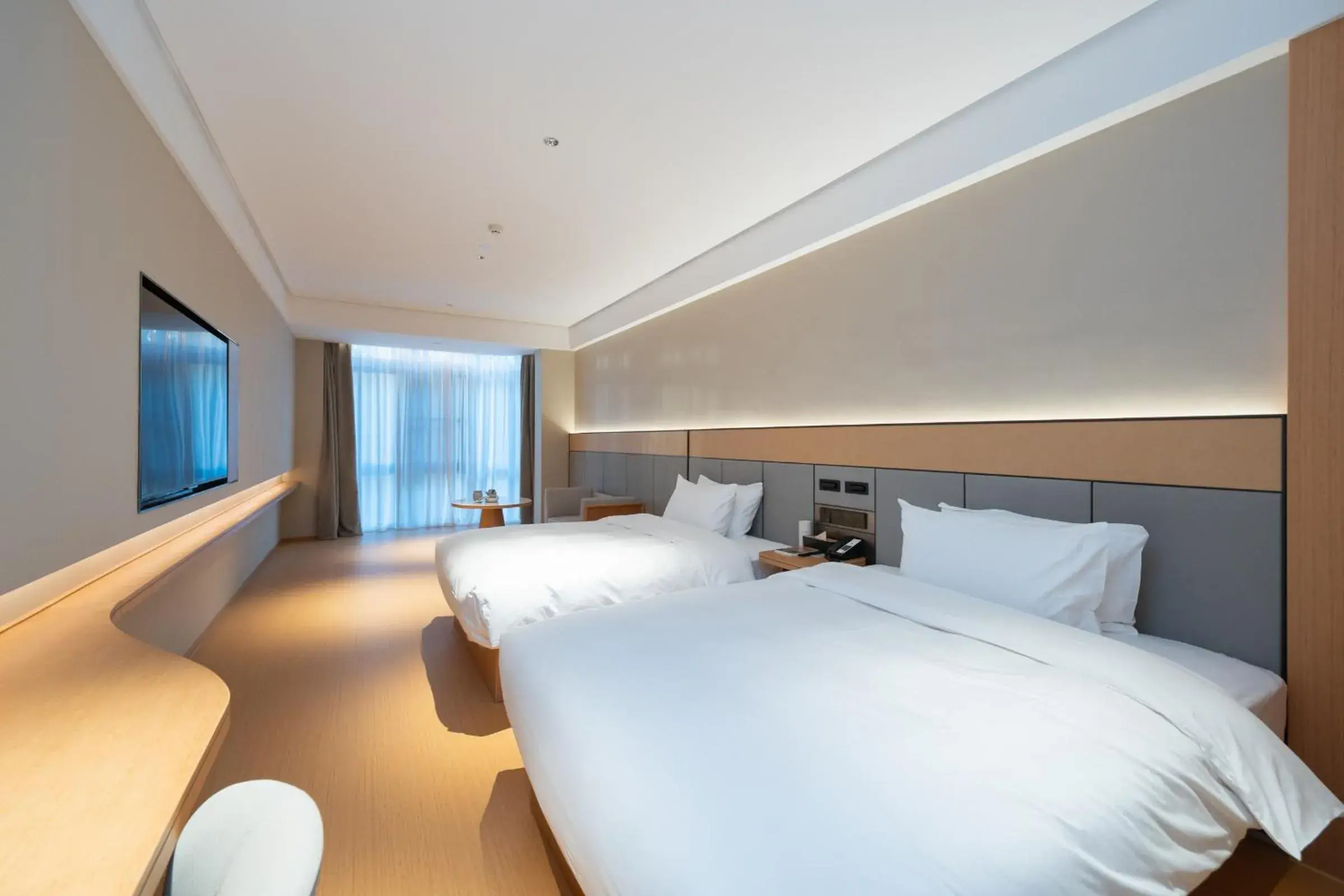 Bed in JI Hotel Guangzhou Panyu Chimelong Wanbo Center Bed in JI Hotel Guangzhou Panyu Chimelong Wanbo Center