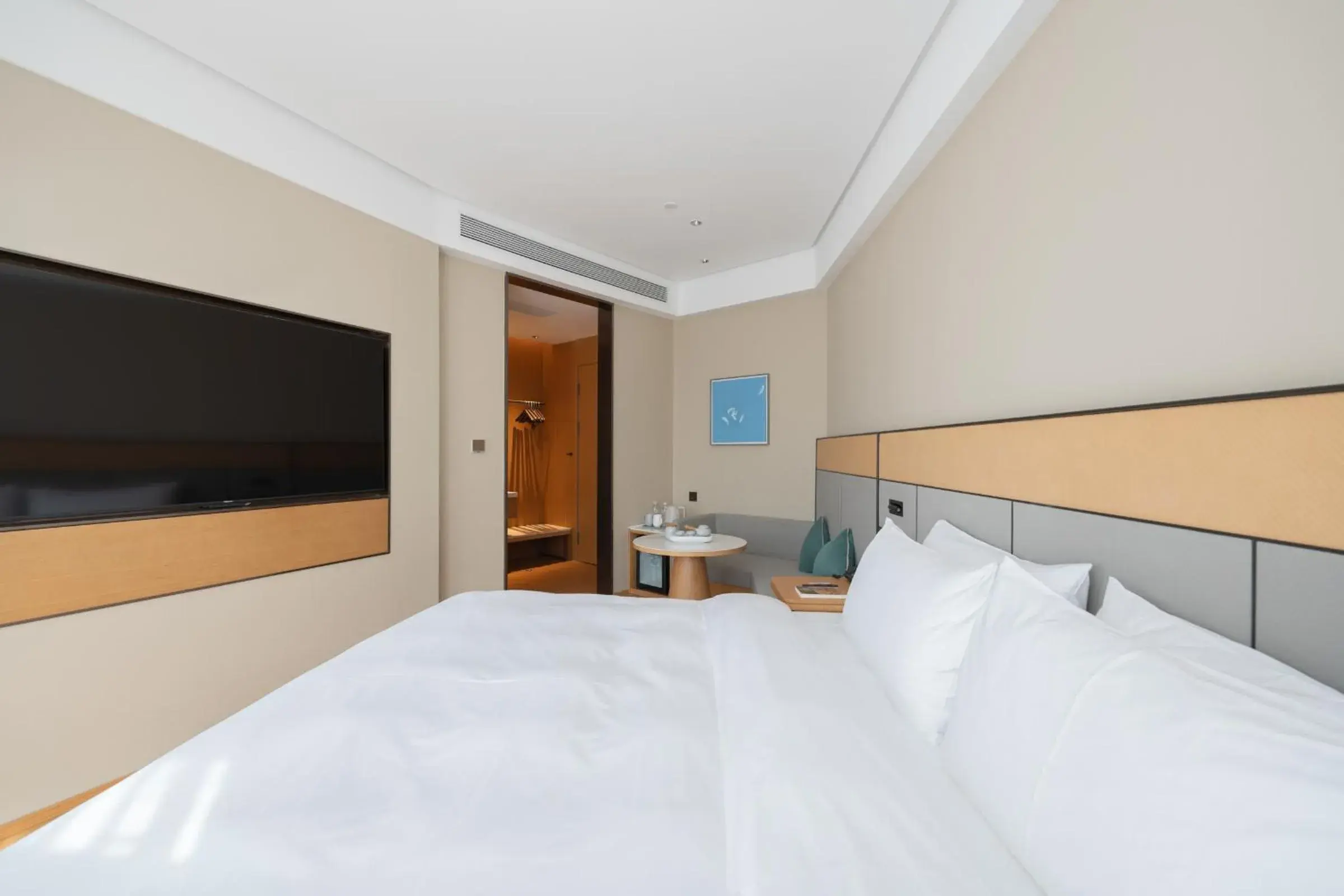 Bed in JI Hotel Guangzhou Panyu Chimelong Wanbo Center Bed in JI Hotel Guangzhou Panyu Chimelong Wanbo Center