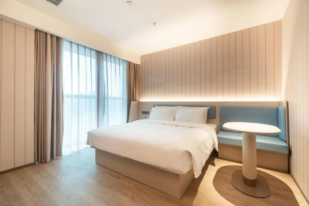 Bed in Hanting Hotel Shenzhen Shiyan Bus Station