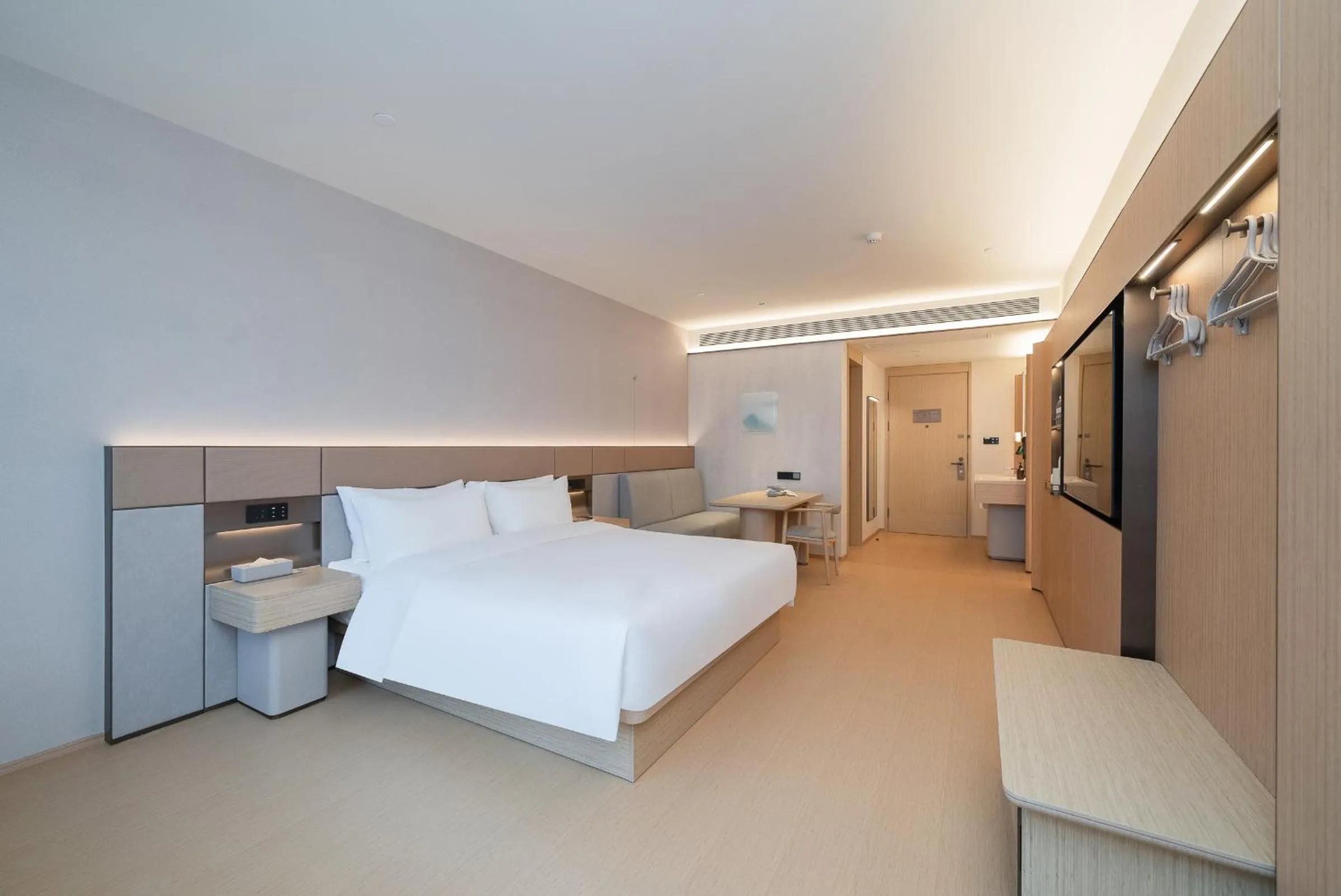 Bed in JI Hotel Guangzhou Huangpu Dasha East Subway Station