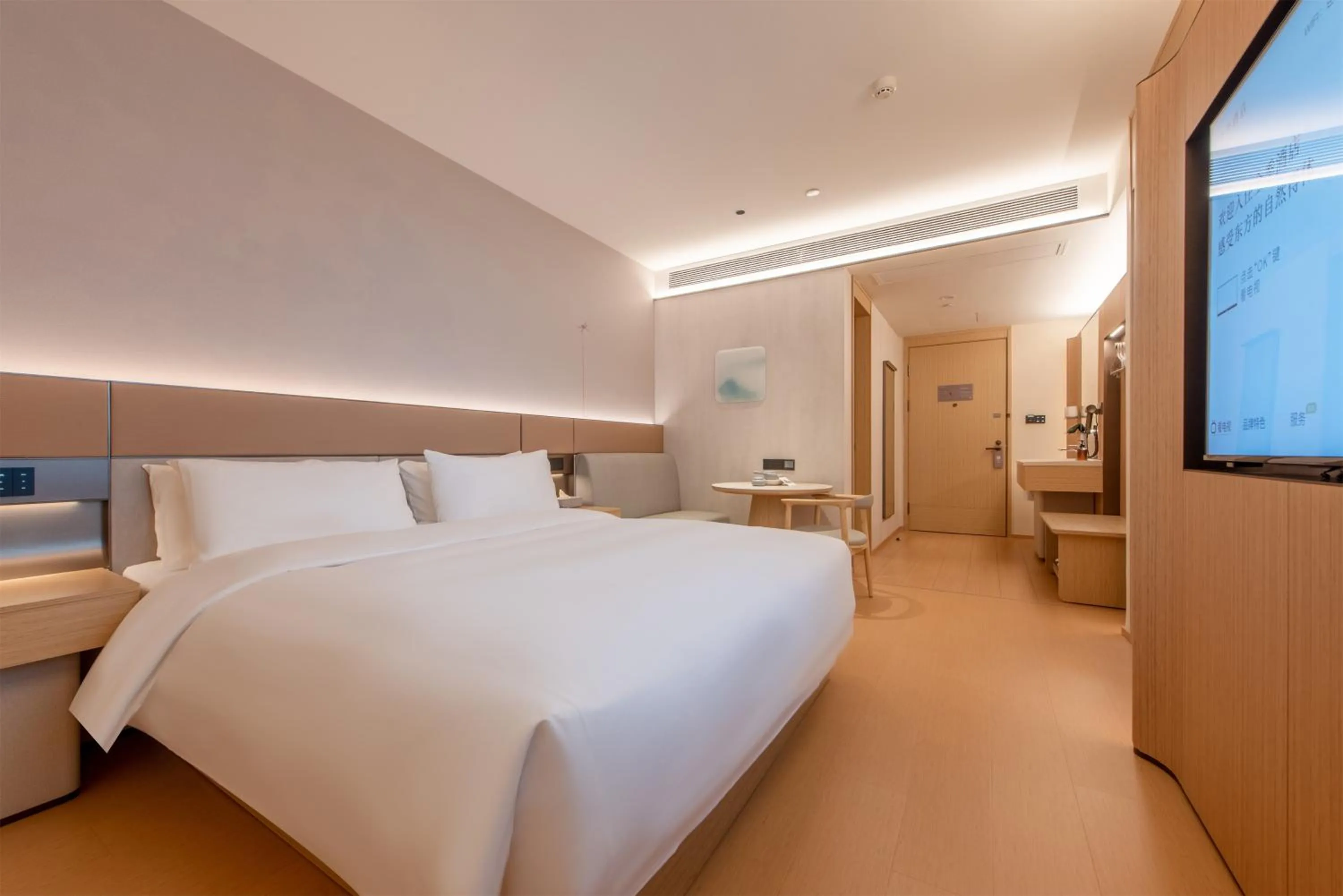 Bed in JI Hotel Guangzhou Huangpu Dasha East Subway Station