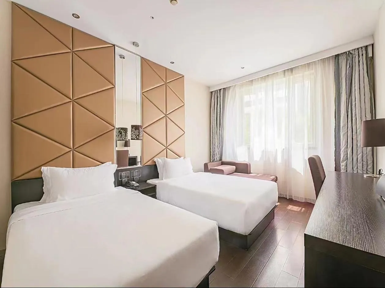 Bed in Orange Hotel Shanghai Xujiahui Damuqiao Road