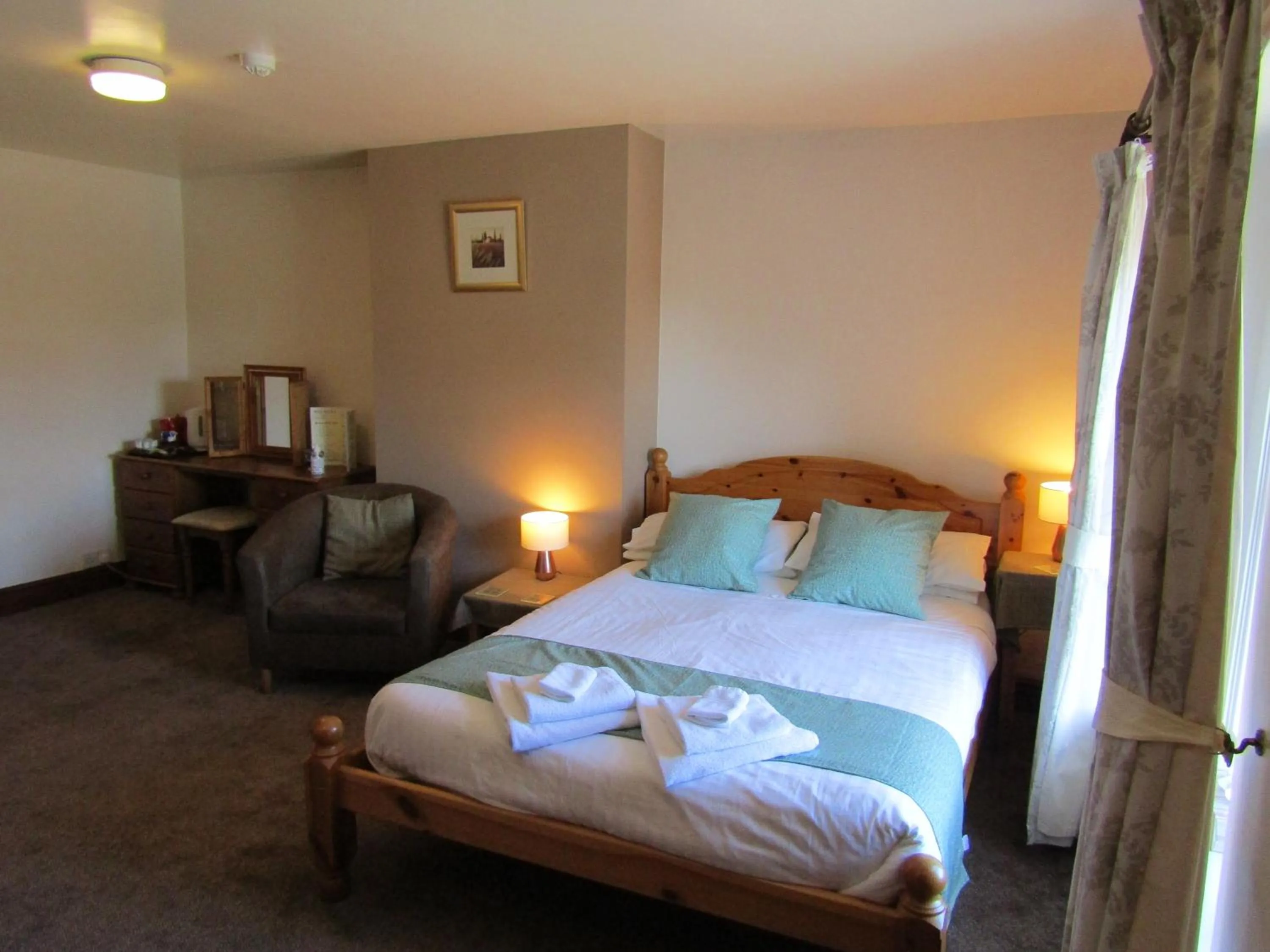 Bed in The Belted Will Inn