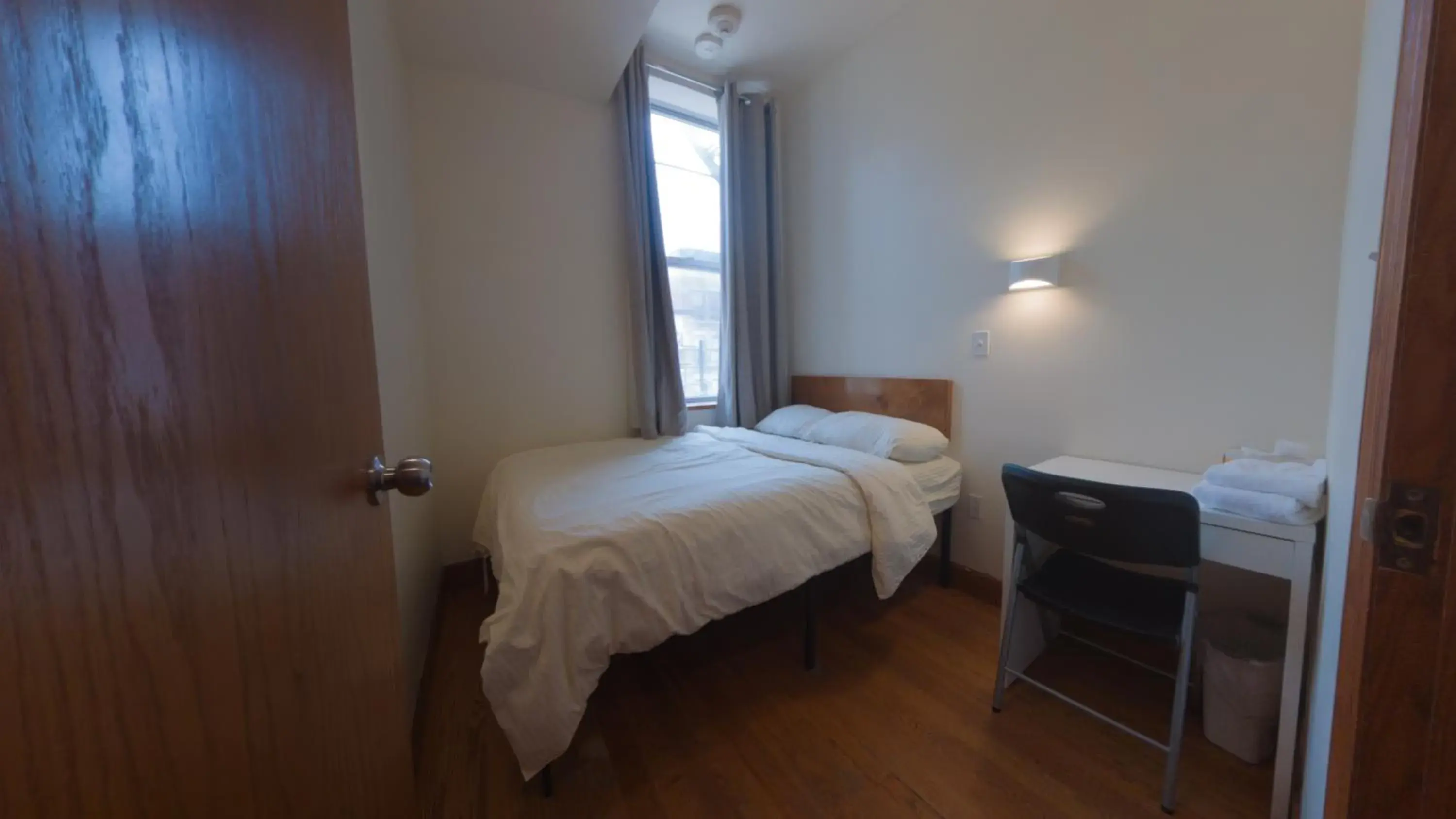 Bed in U.S. Pacific Hotel Bed in U.S. Pacific Hotel