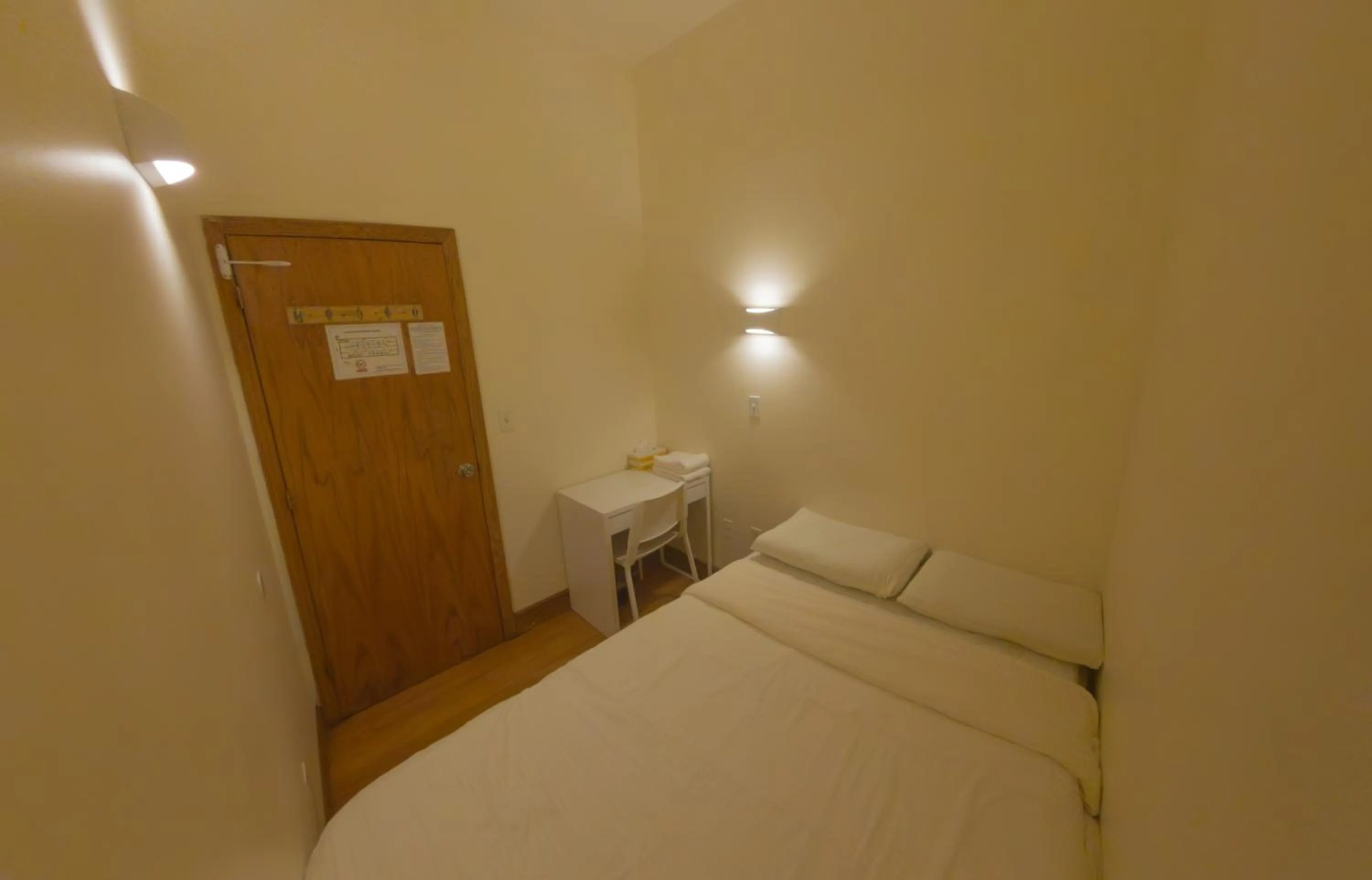 Bed in U.S. Pacific Hotel