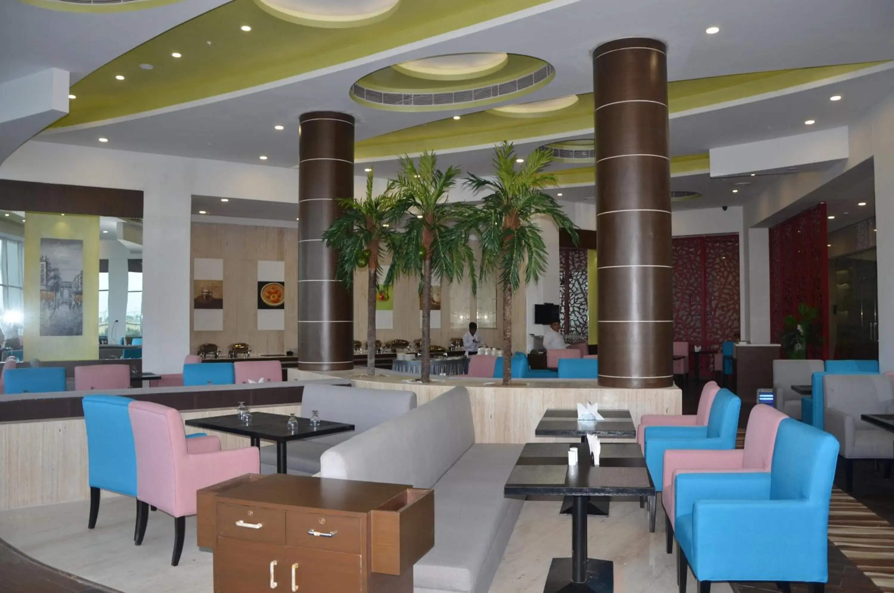 Lounge or bar in Ramada by Wyndham Bodh Gaya Mahabodhi Lounge or bar in Ramada by Wyndham Bodh Gaya Mahabodhi