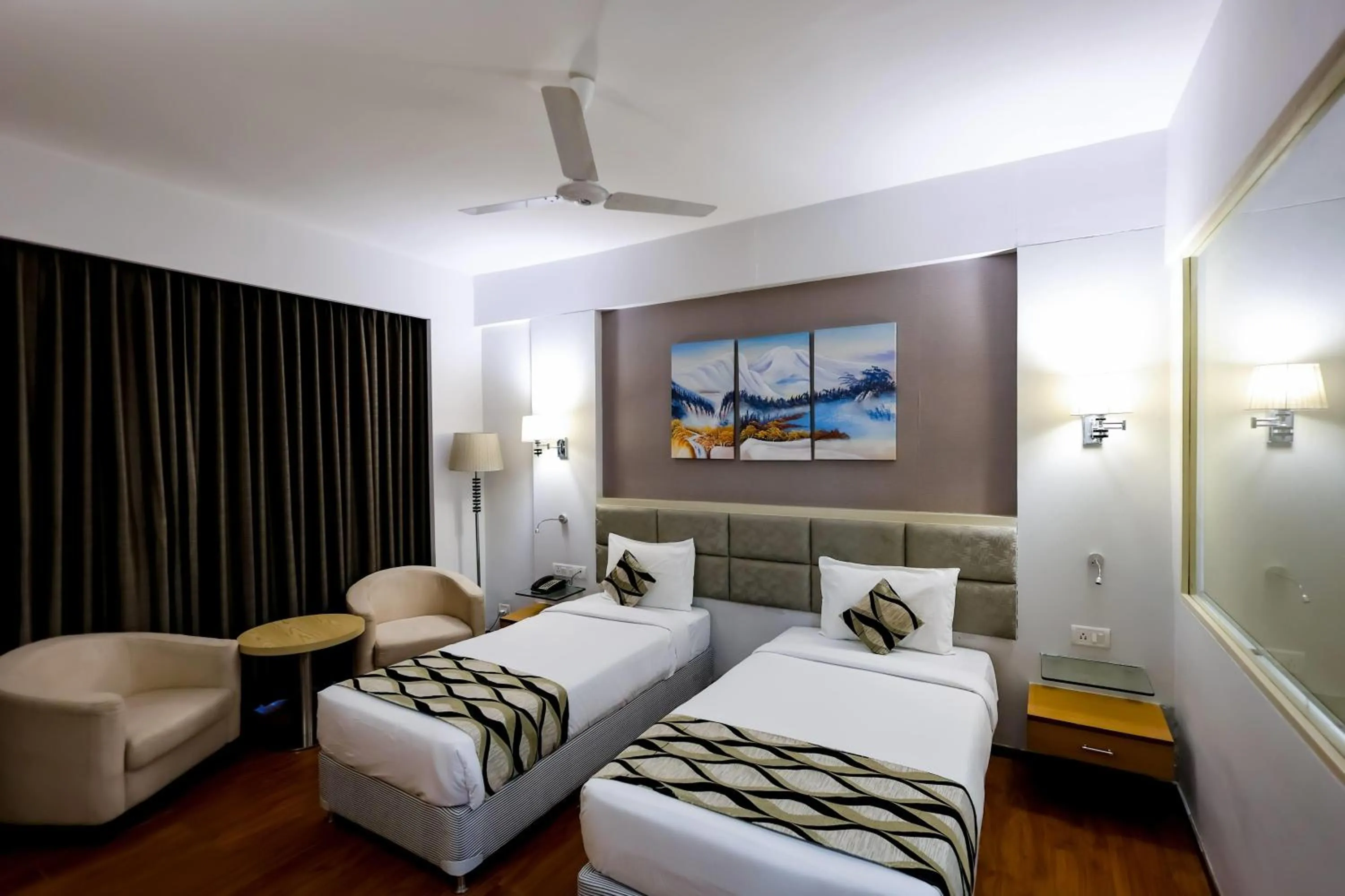 Photo of the whole room, Bed in Ramada by Wyndham Bodh Gaya Mahabodhi