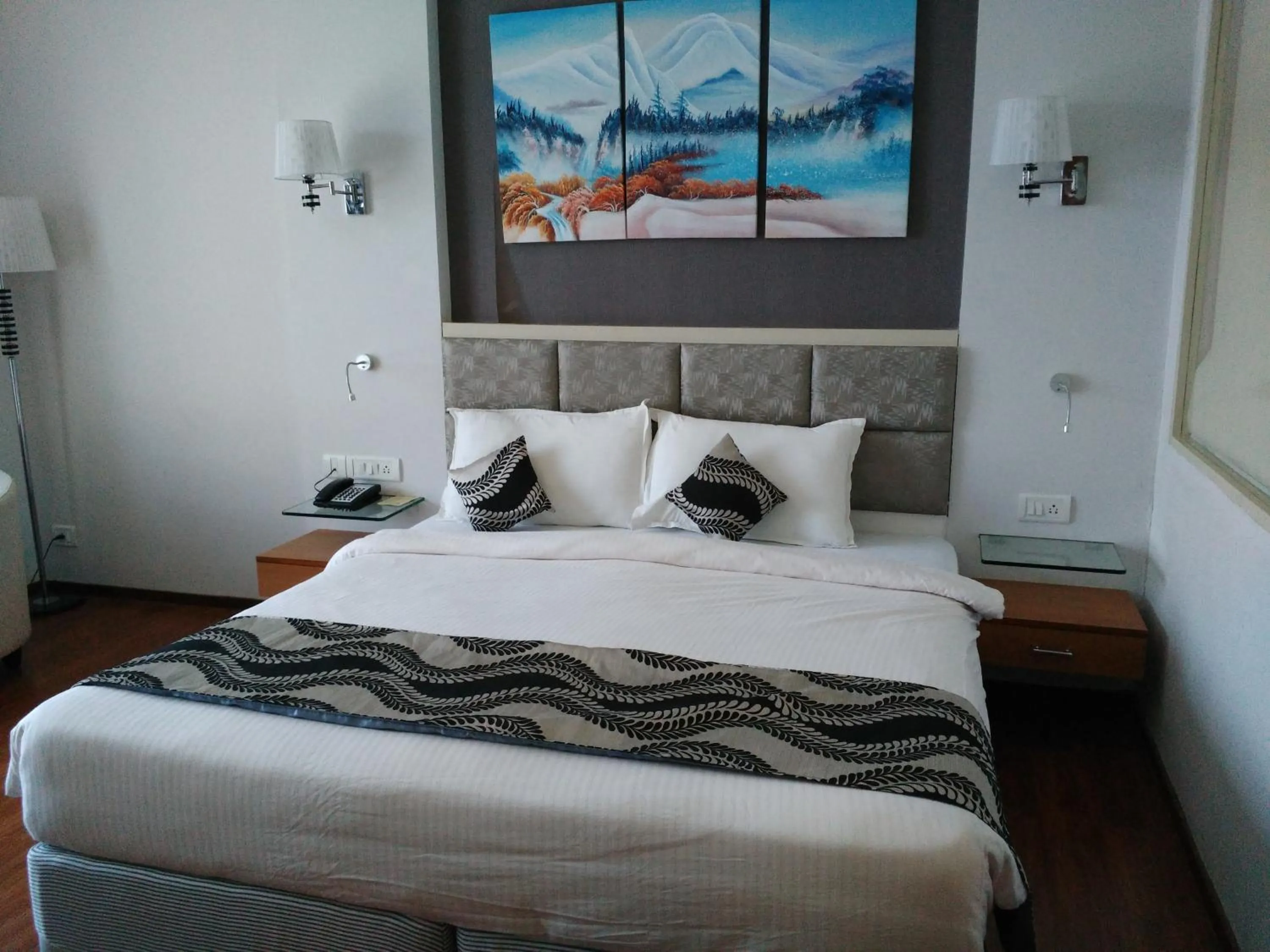 Photo of the whole room, Bed in Maha Bodhi Hotel.Resort.Convention Centre