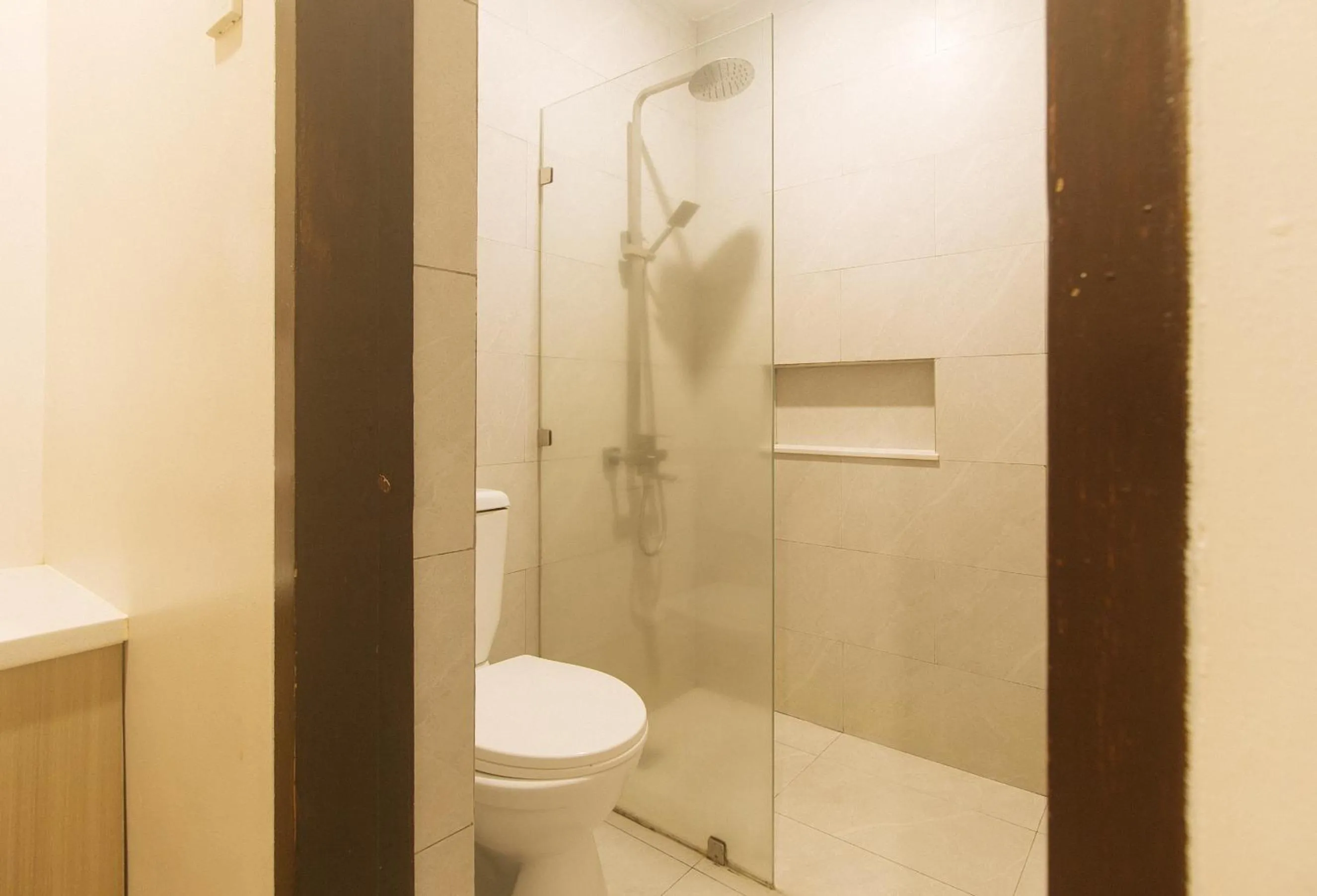 Shower in Elyseah Condotel by RedDoorz