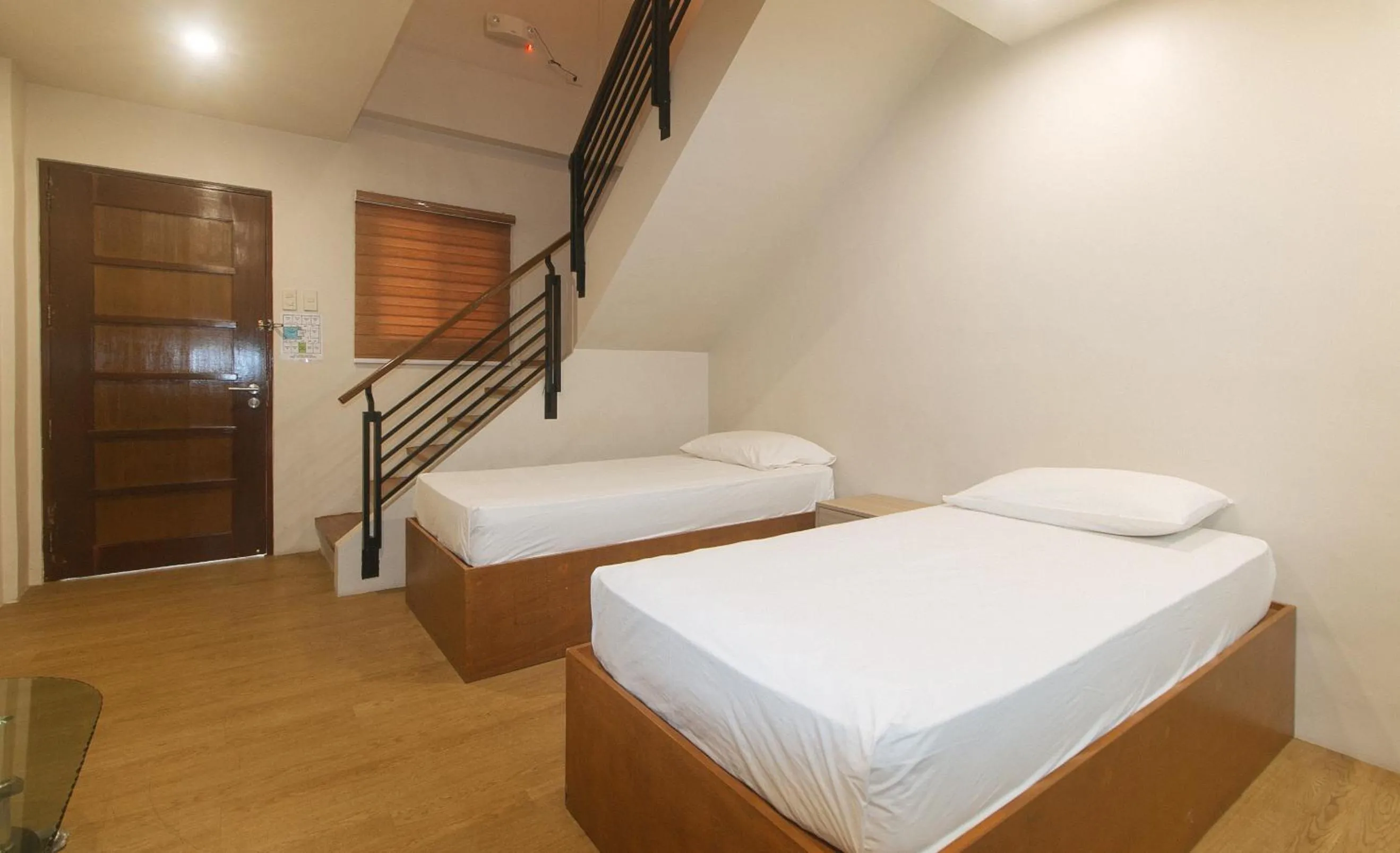 Photo of the whole room, Bed in Elyseah Condotel by RedDoorz