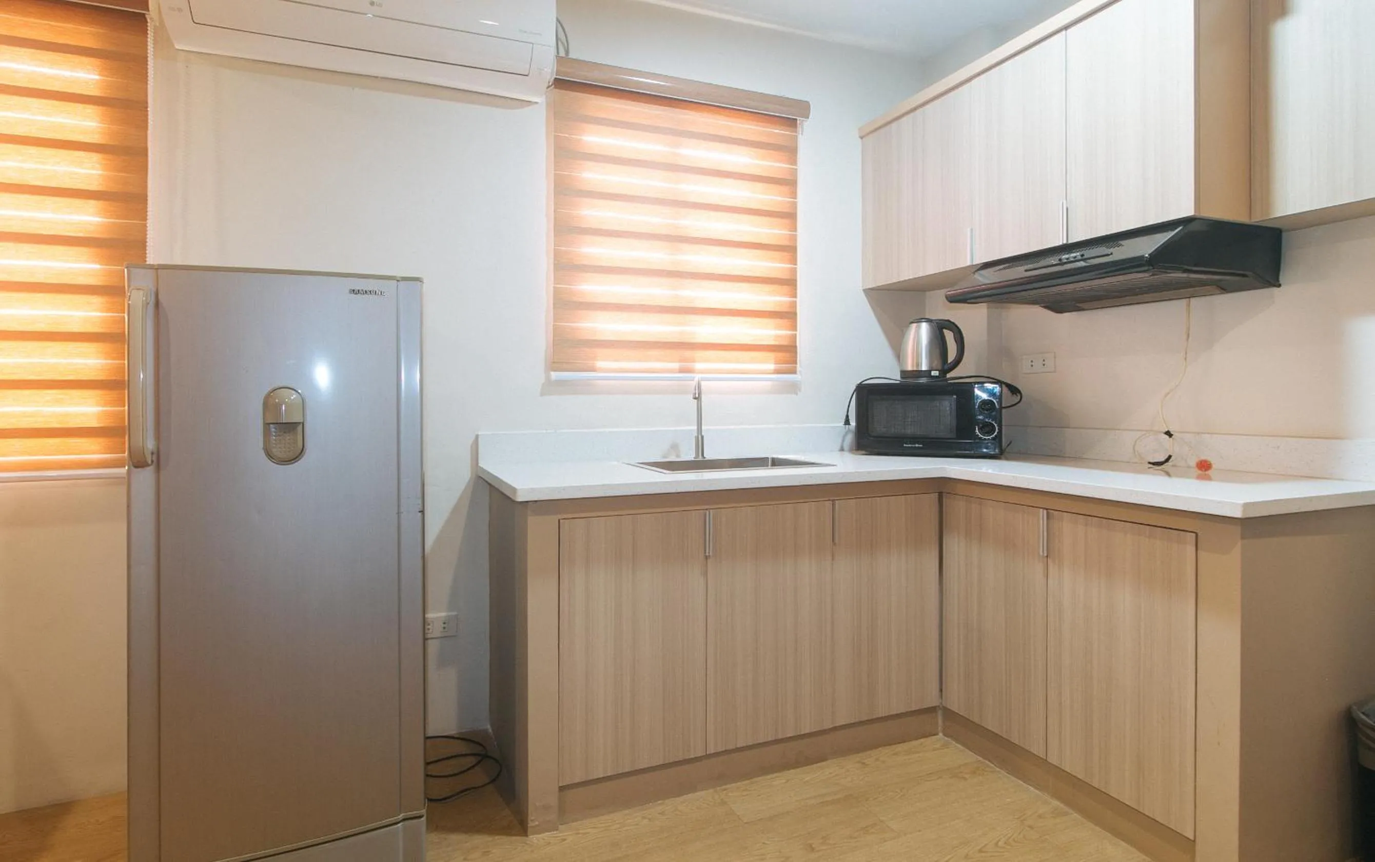 Kitchen or kitchenette in Elyseah Condotel by RedDoorz