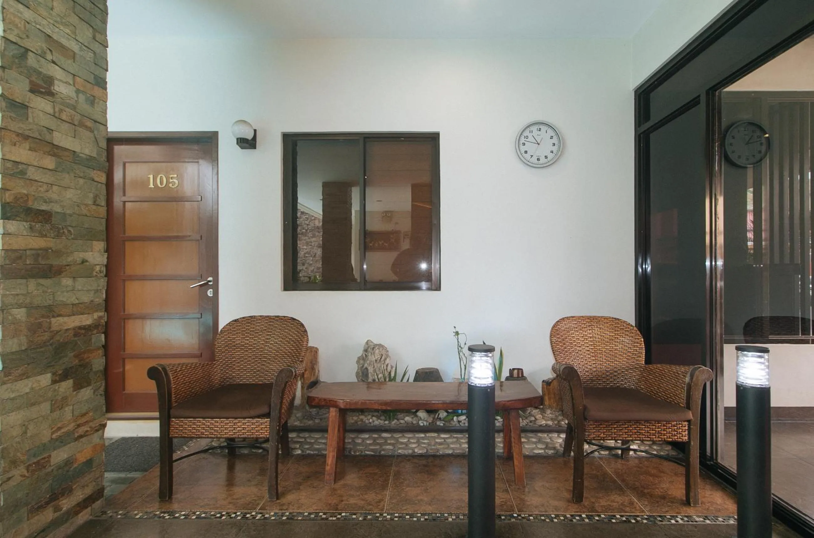 Seating area in Elyseah Condotel by RedDoorz