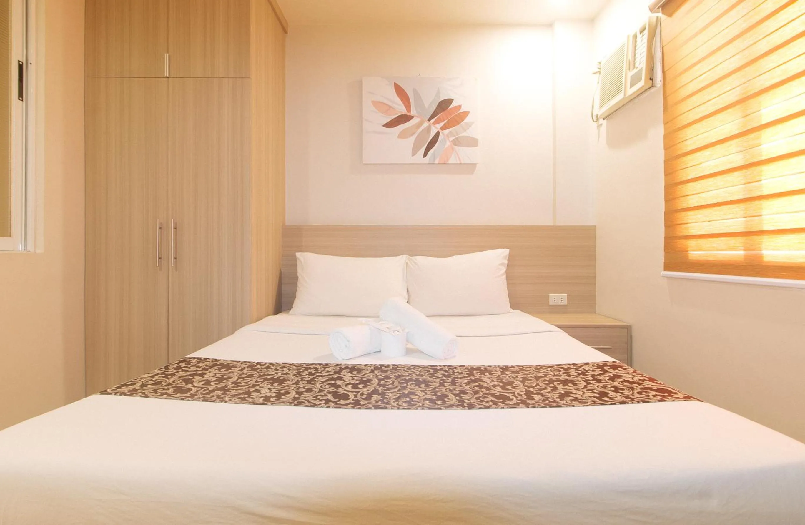 Bed in Elyseah Condotel by RedDoorz
