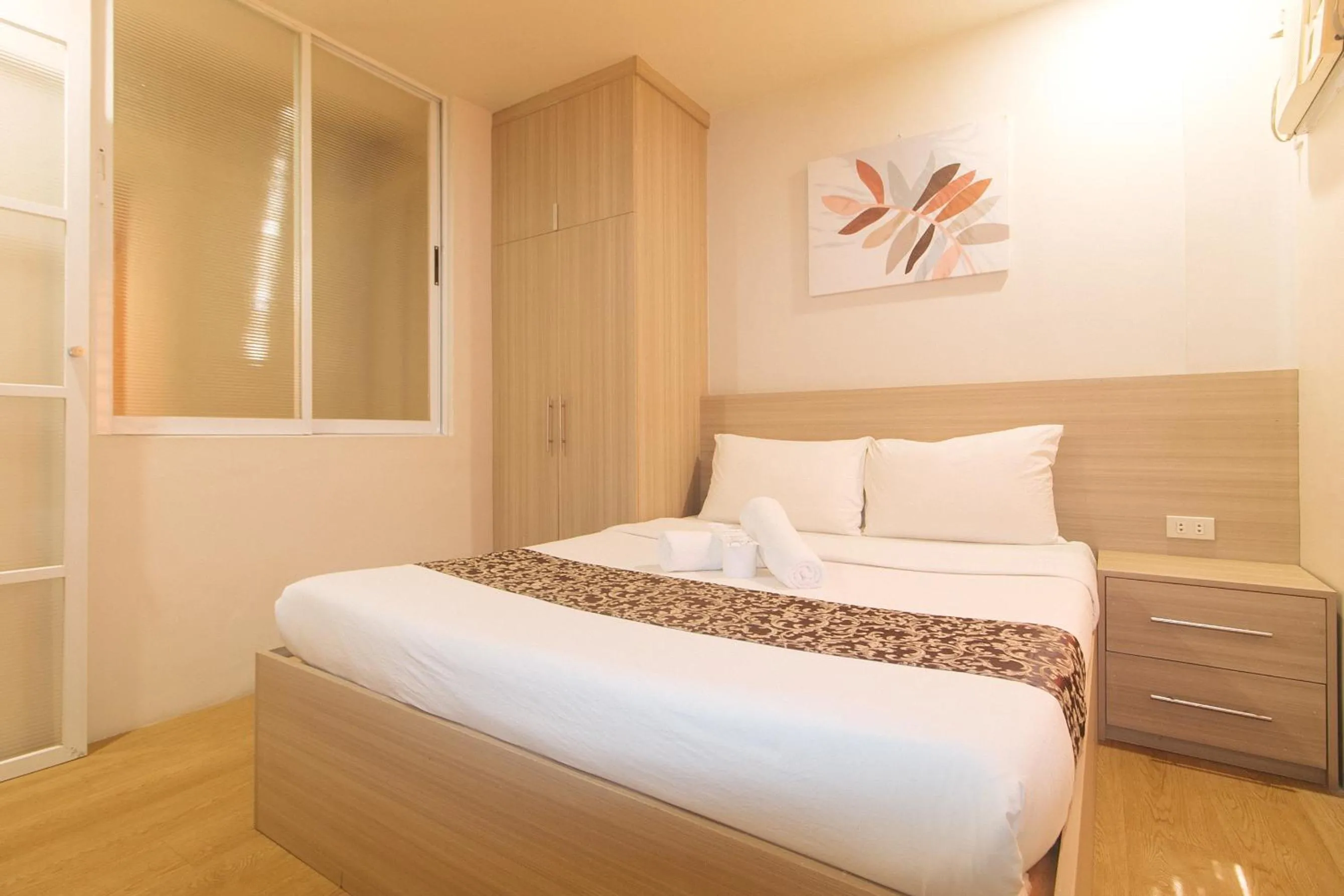 Bed in Elyseah Condotel by RedDoorz