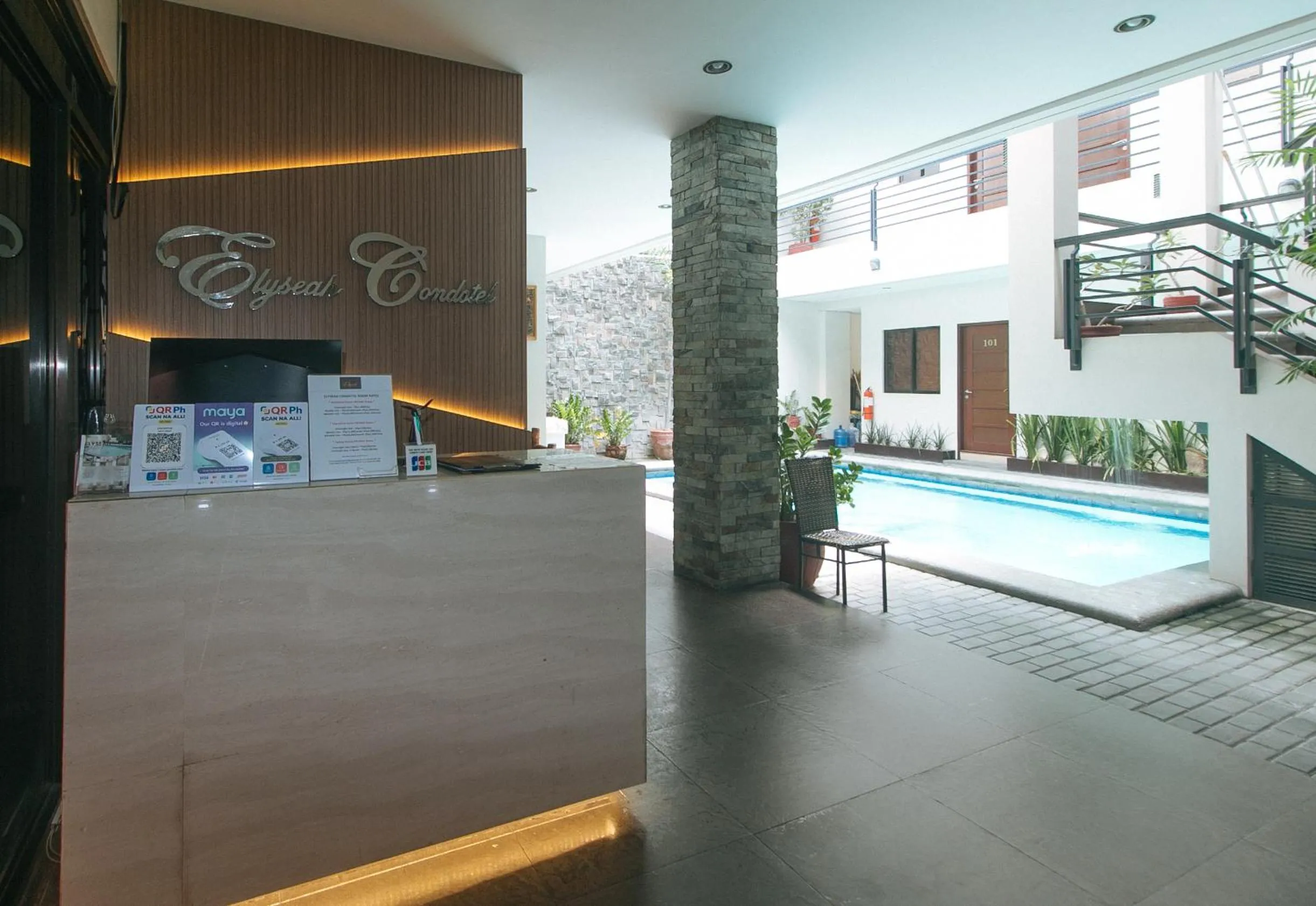 Lobby or reception in Elyseah Condotel by RedDoorz