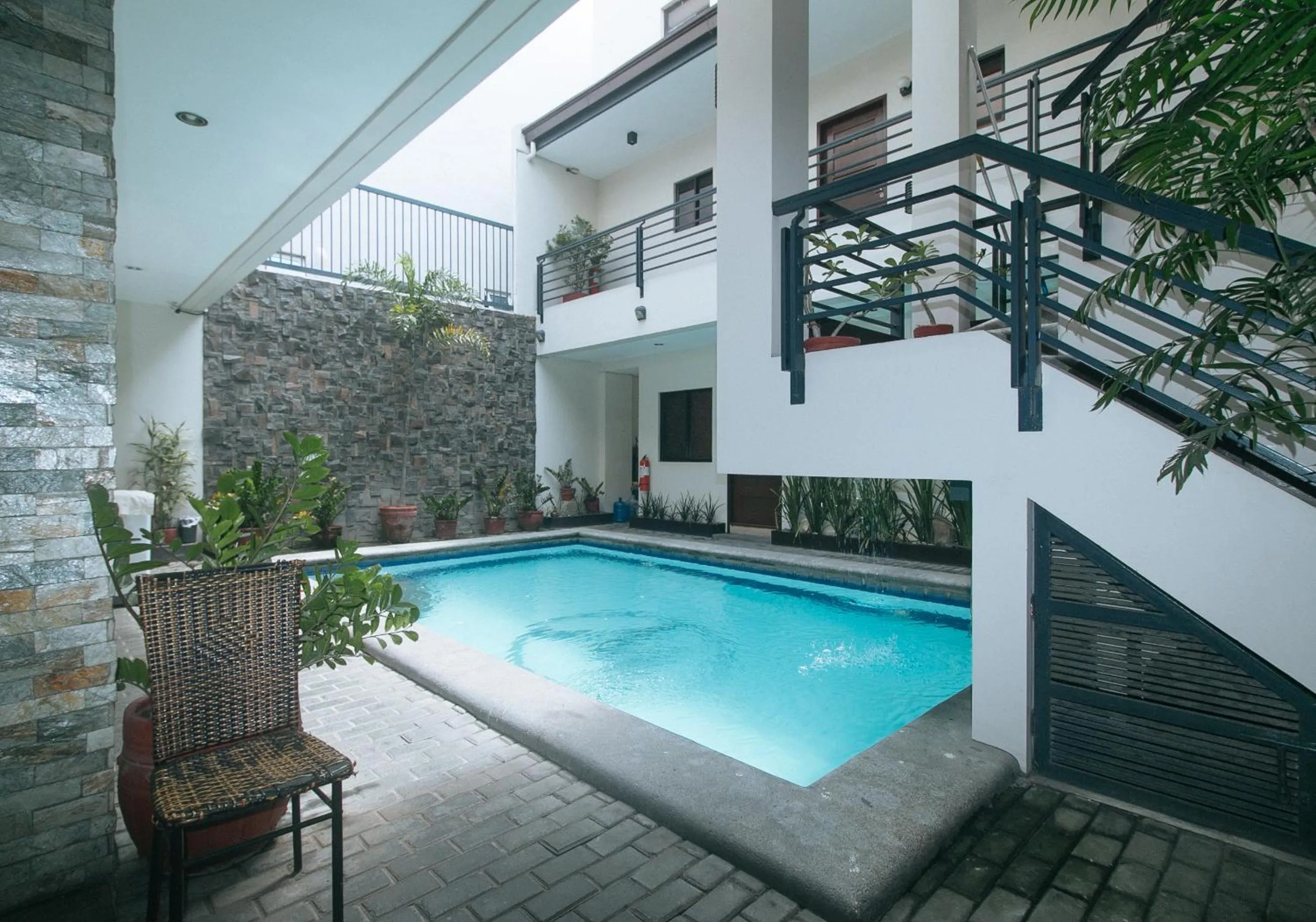 Pool view in Elyseah Condotel by RedDoorz