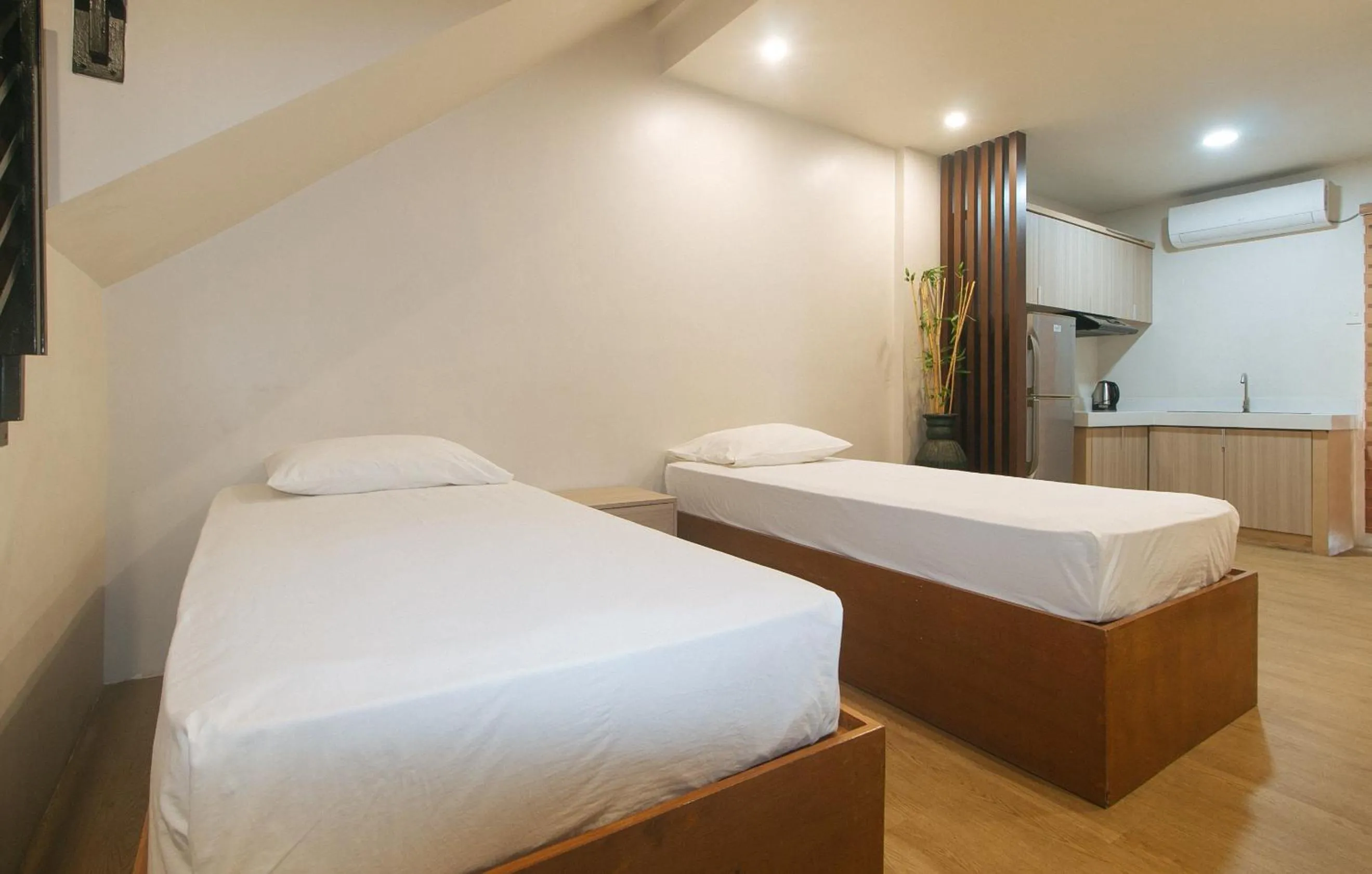 Photo of the whole room, Bed in Elyseah Condotel by RedDoorz