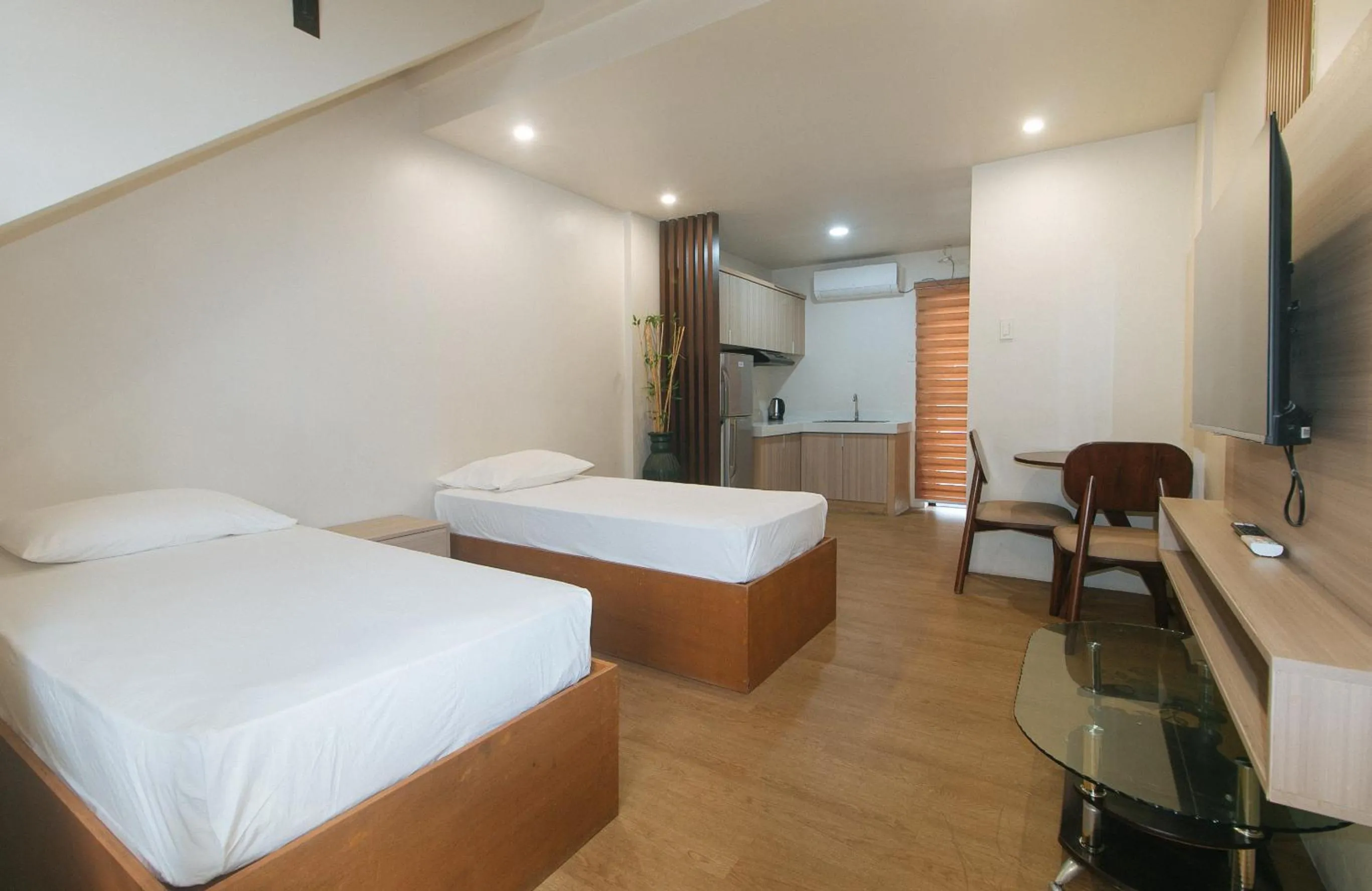 Bed in Elyseah Condotel by RedDoorz