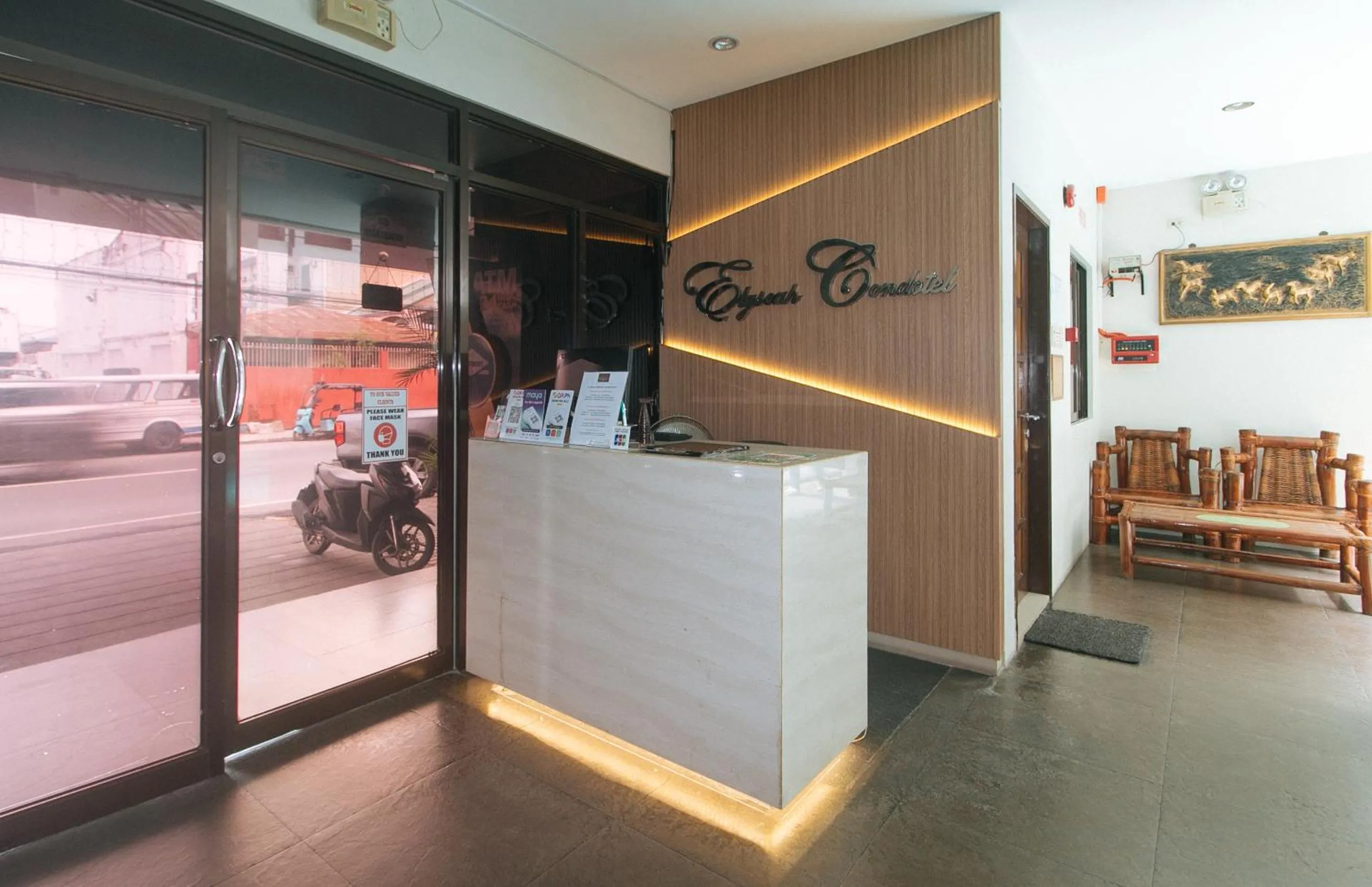 Lobby or reception in Elyseah Condotel by RedDoorz