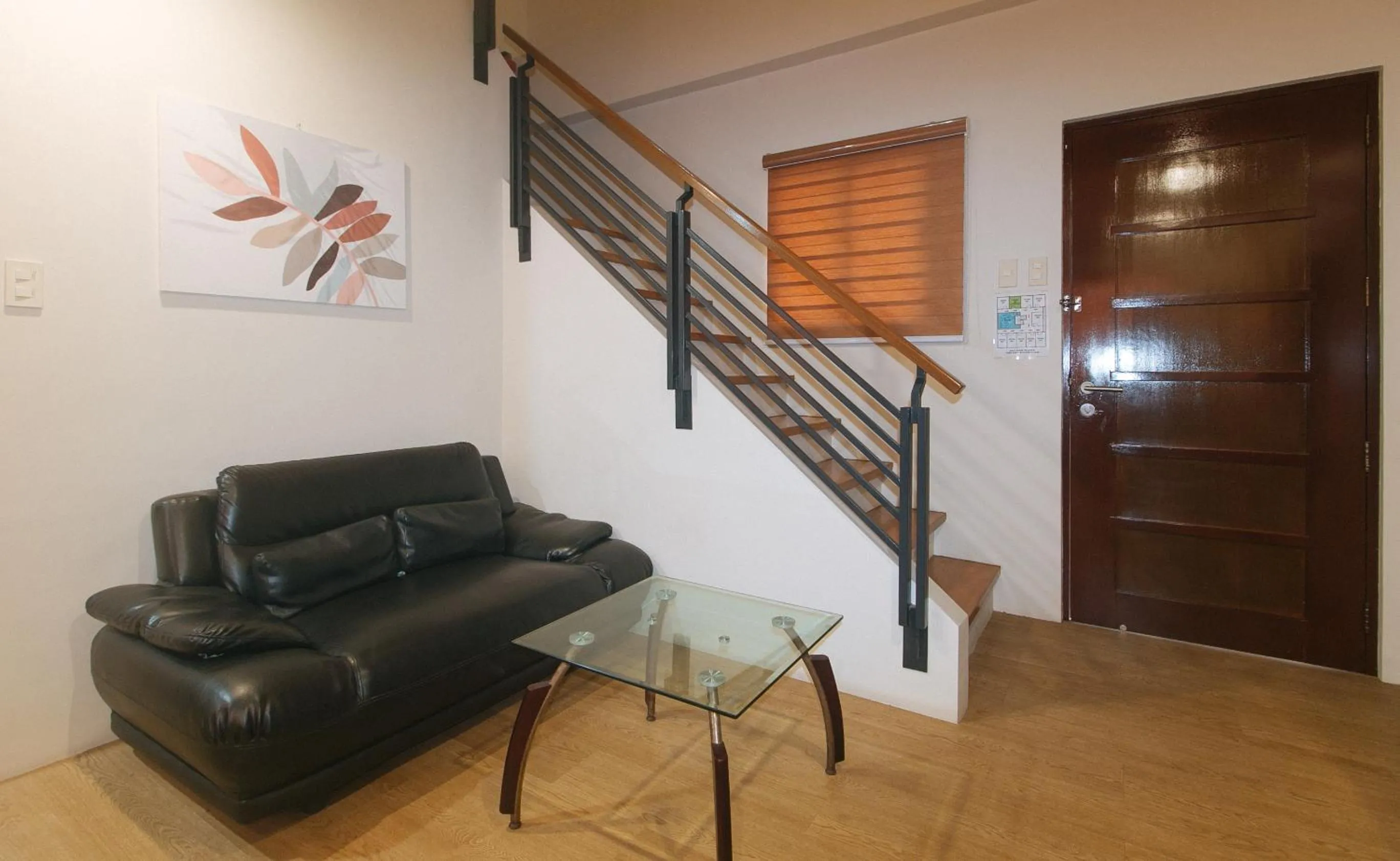 Seating area in Elyseah Condotel by RedDoorz