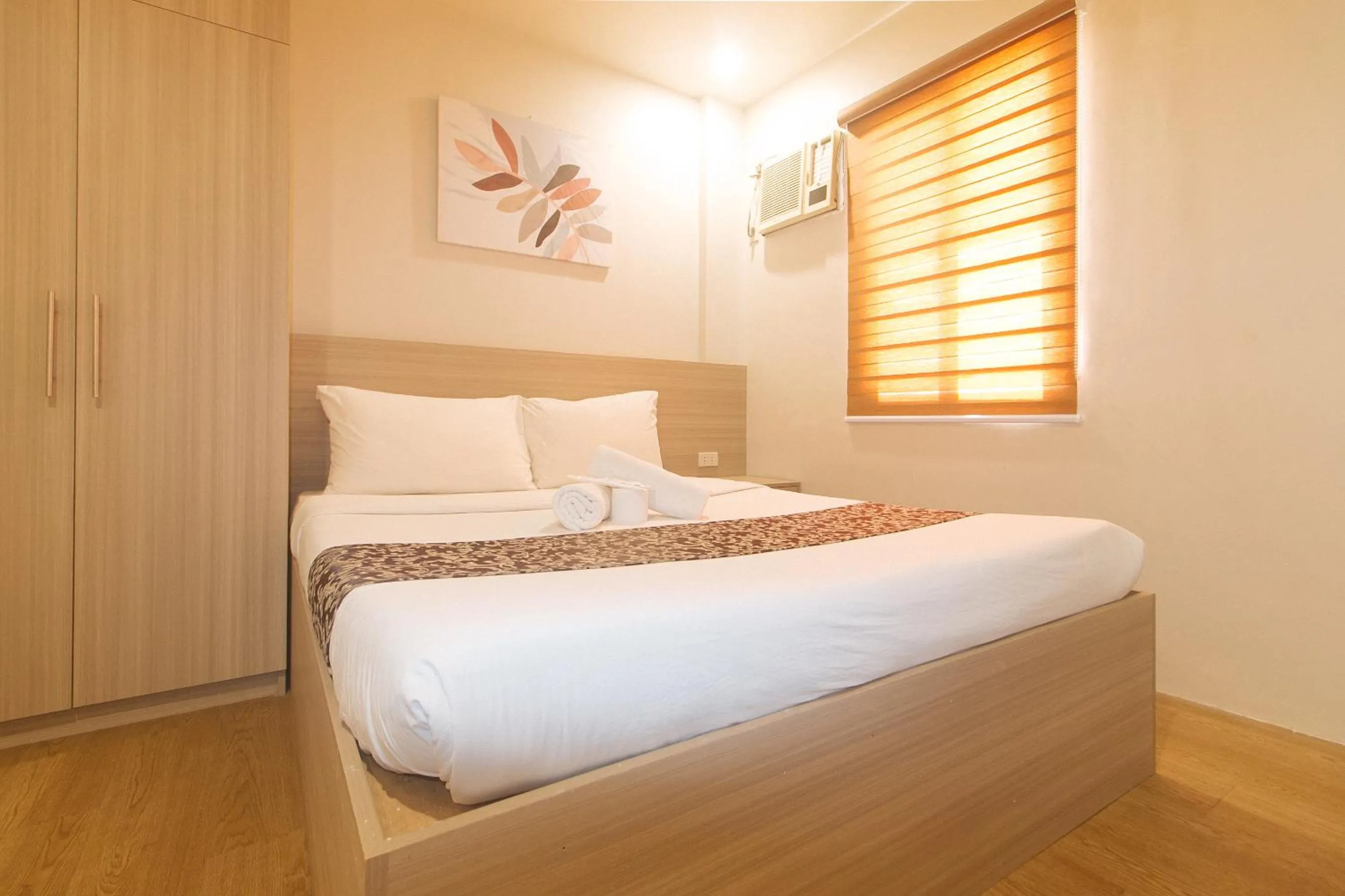 Bedroom, Bed in Elyseah Condotel by RedDoorz