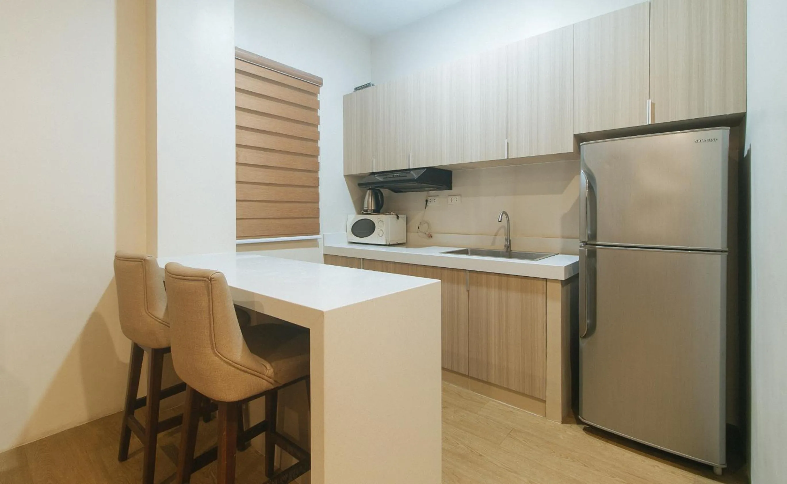 Kitchen or kitchenette in Elyseah Condotel by RedDoorz