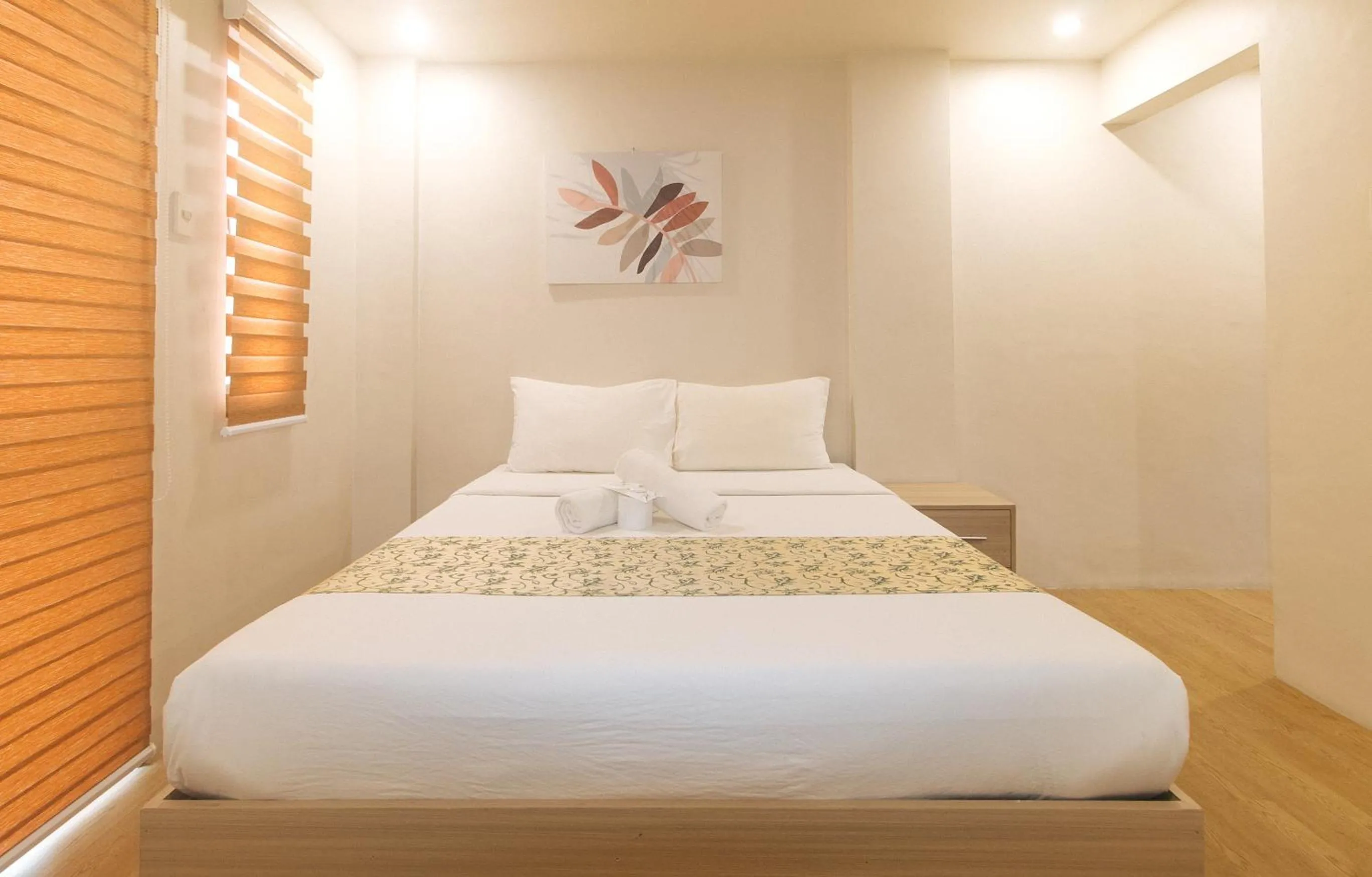 Bed in Elyseah Condotel by RedDoorz