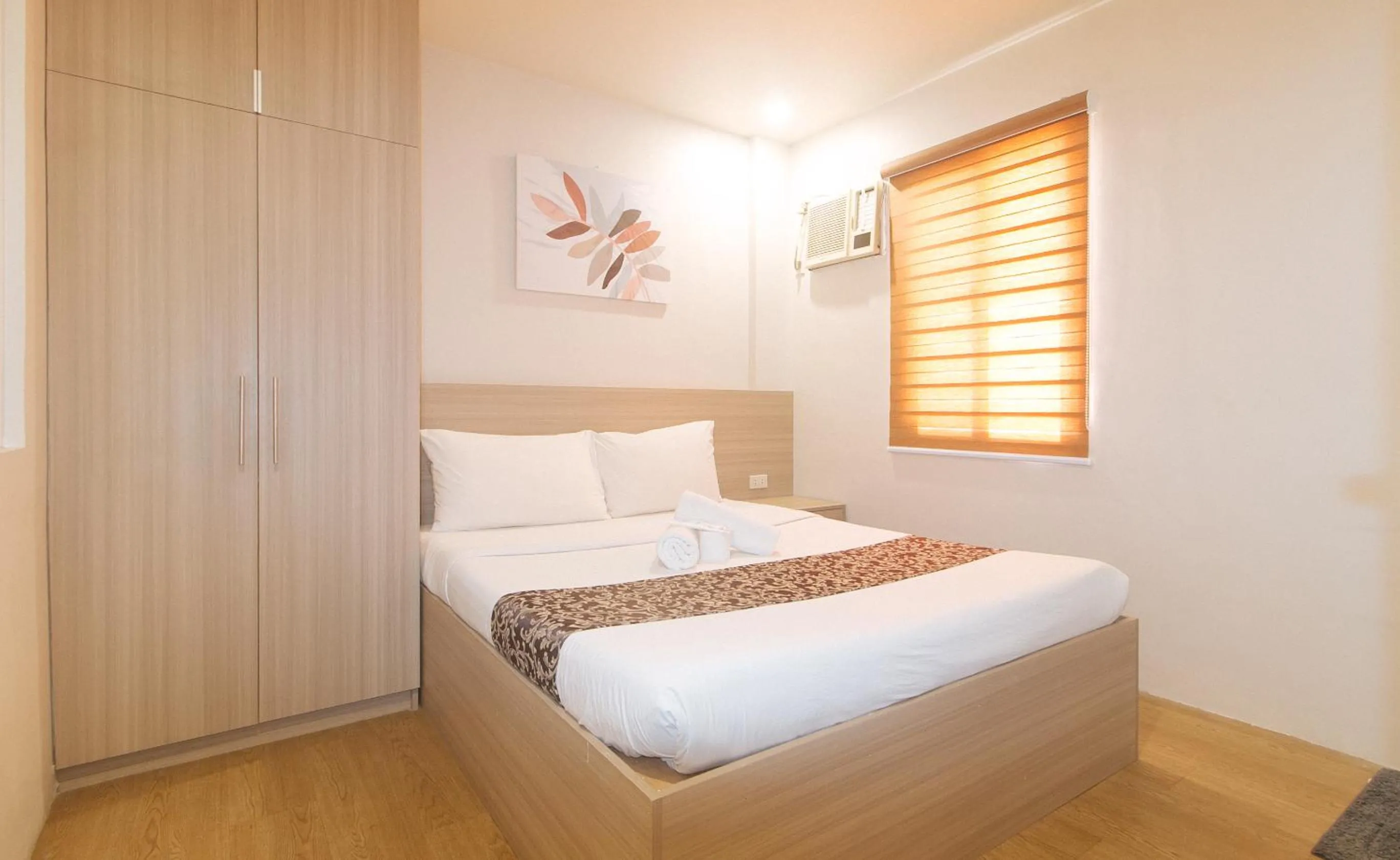 Bed in Elyseah Condotel by RedDoorz