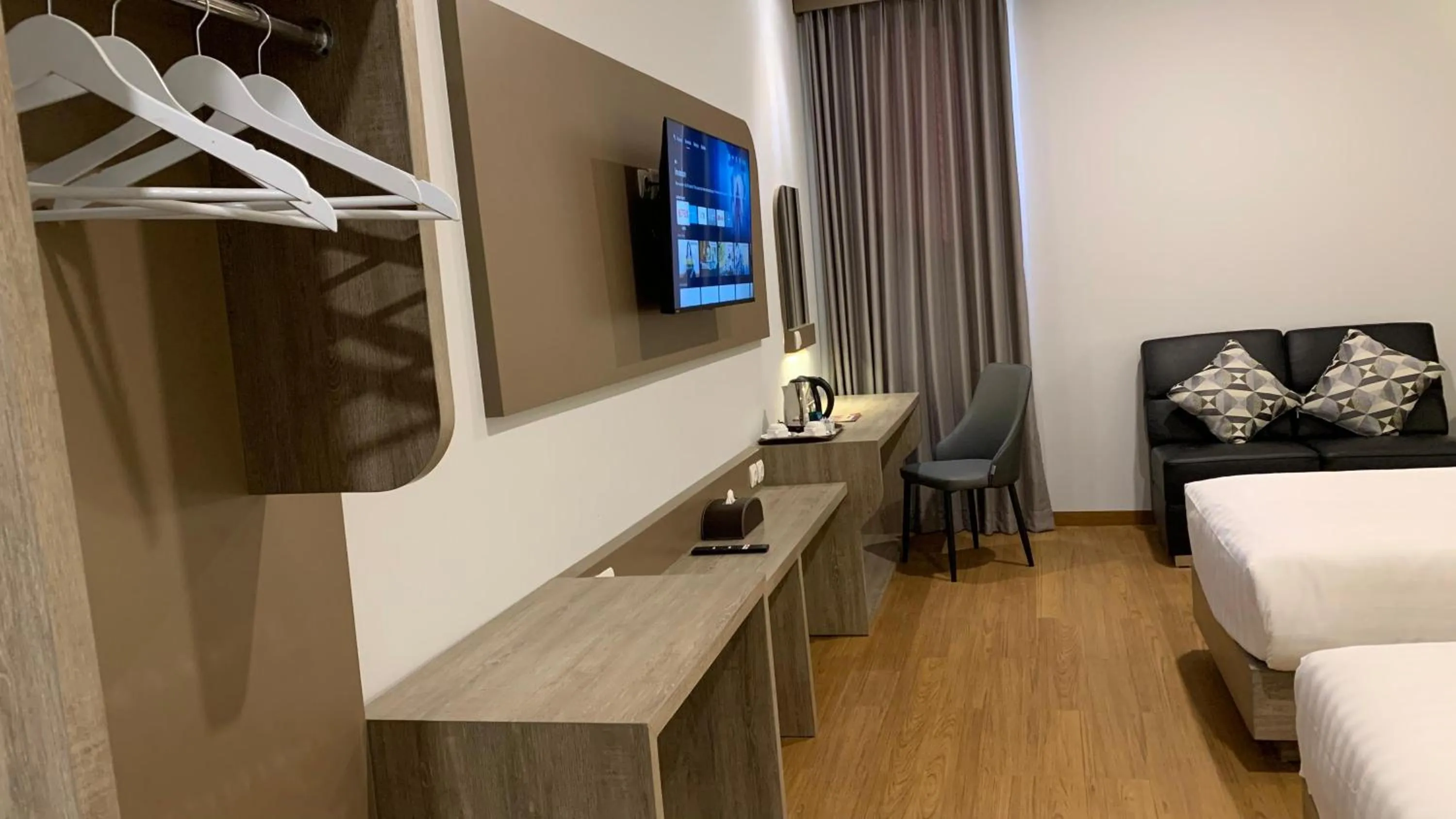 Photo of the whole room, Bed in Azana Style Hotel Lovina Bali