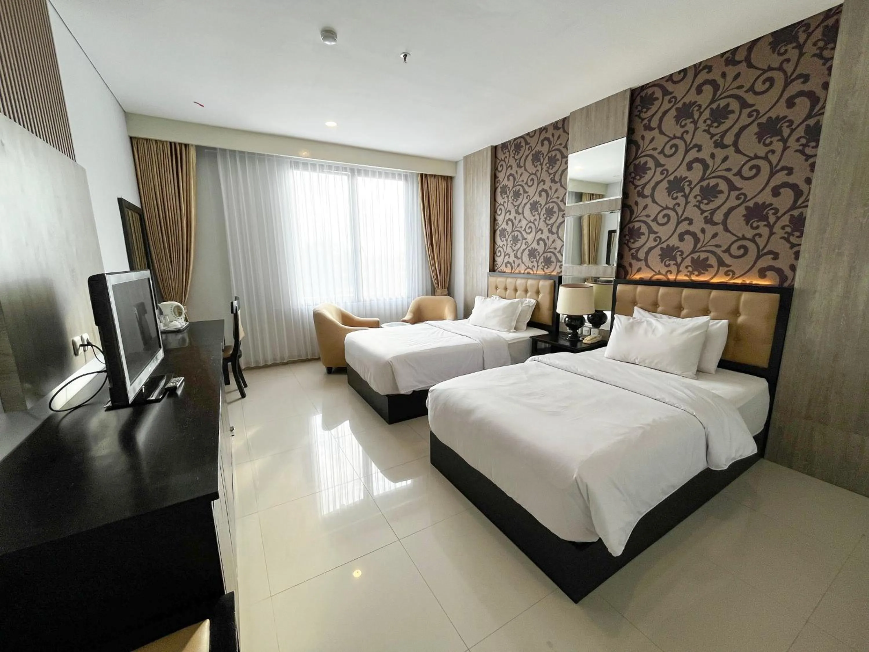 Bed in Azana Style Hotel Lovina Bali