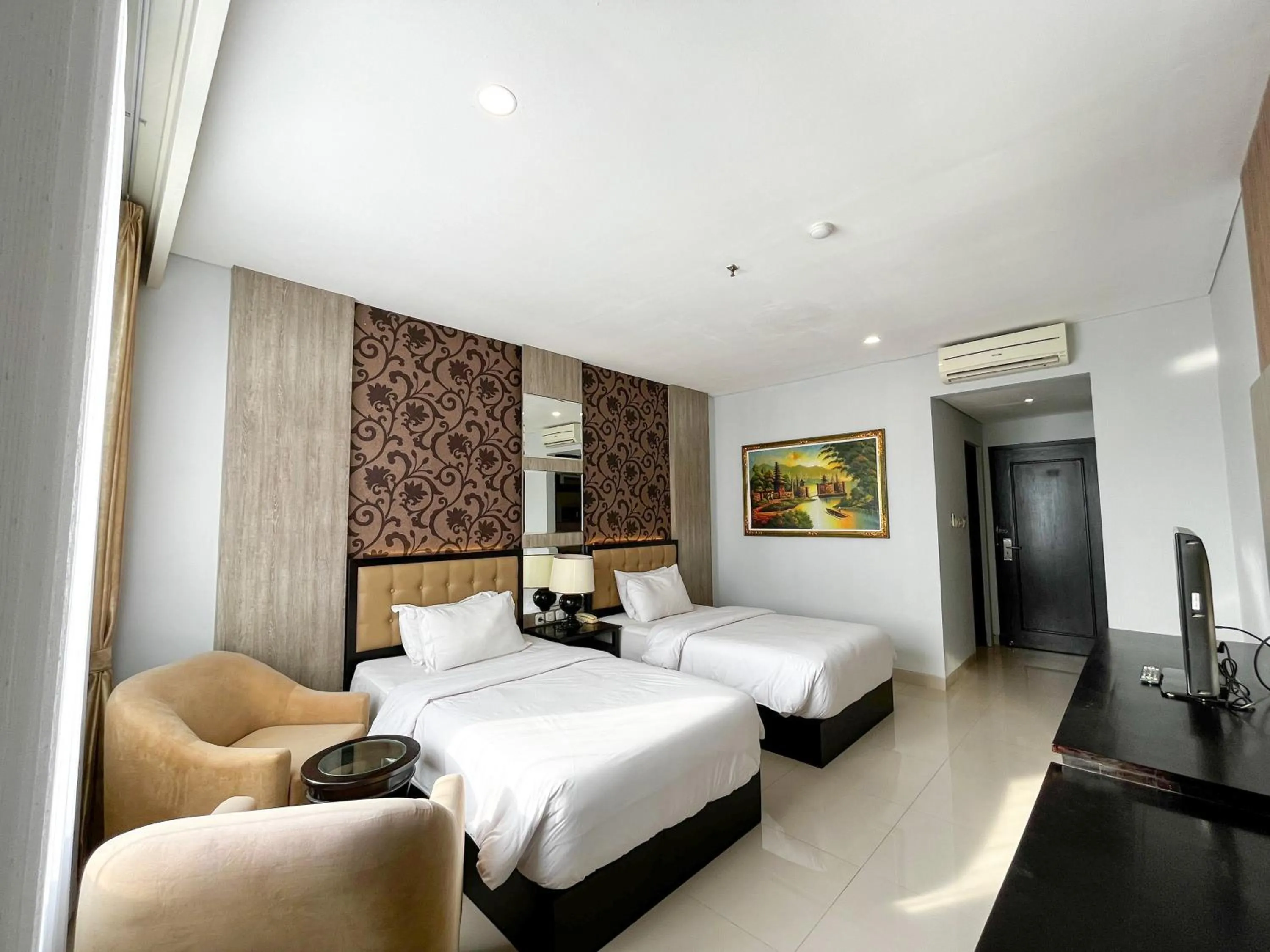 Bed in Azana Style Hotel Lovina Bali