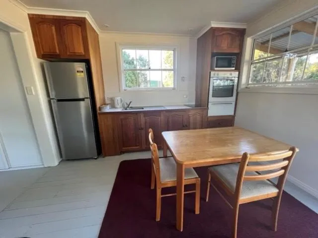 Kitchen or kitchenette in Glenaire Apartments at Frazer St