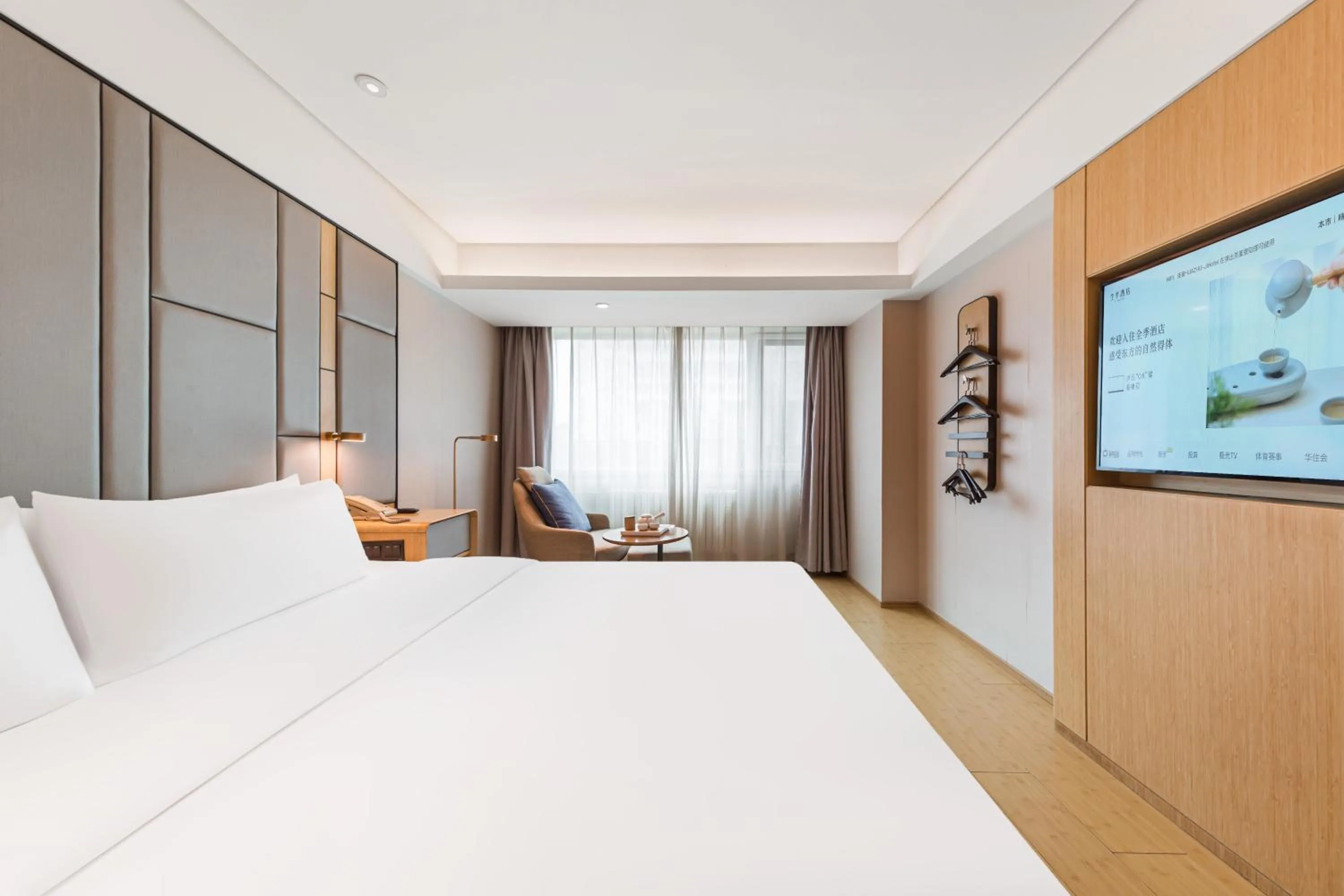 Bed in JI Hotel Beijing Nanluoguxiang Andingmen Subway Station