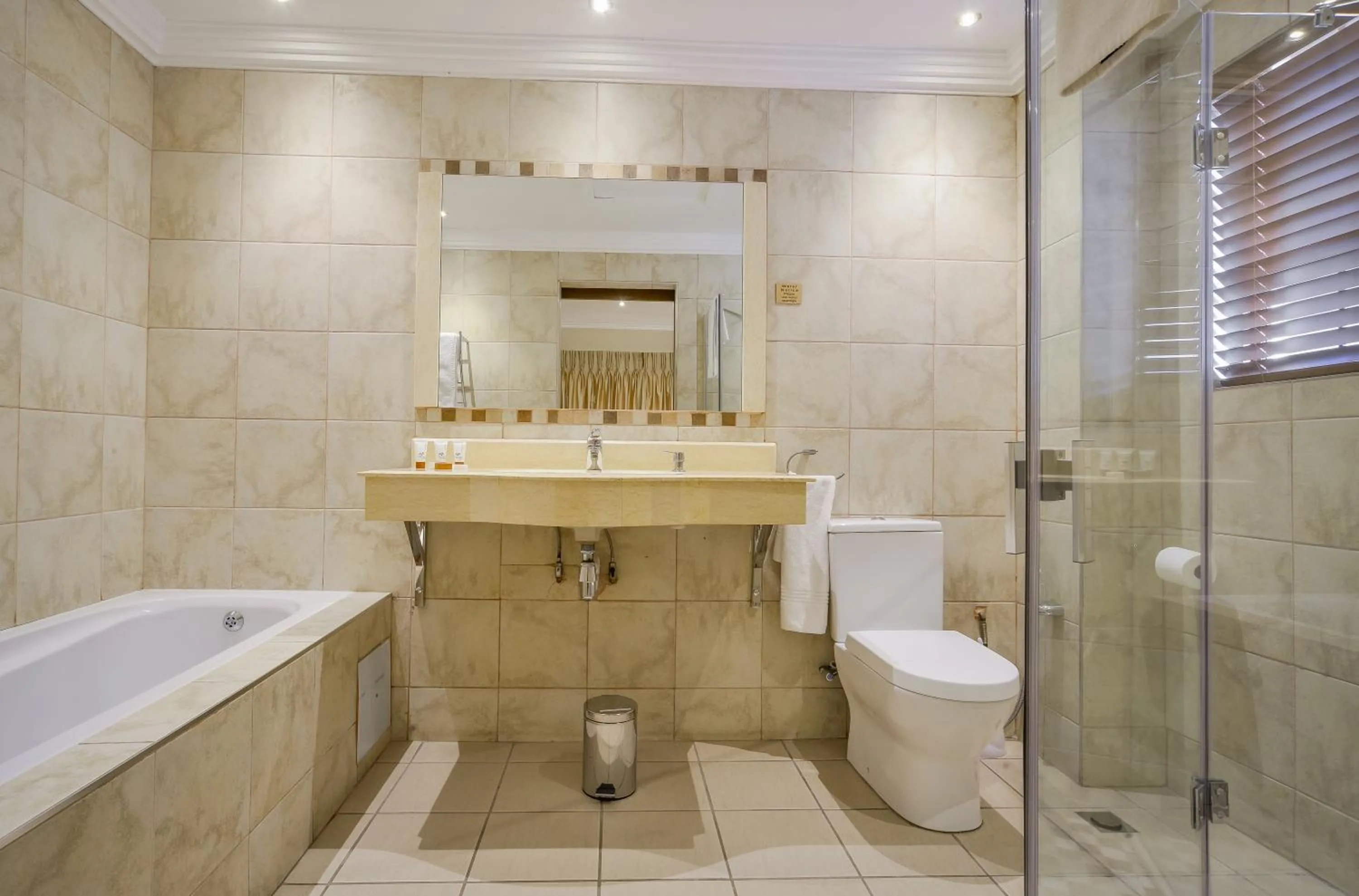 Bathroom in The Cycad Lodge & Chalets