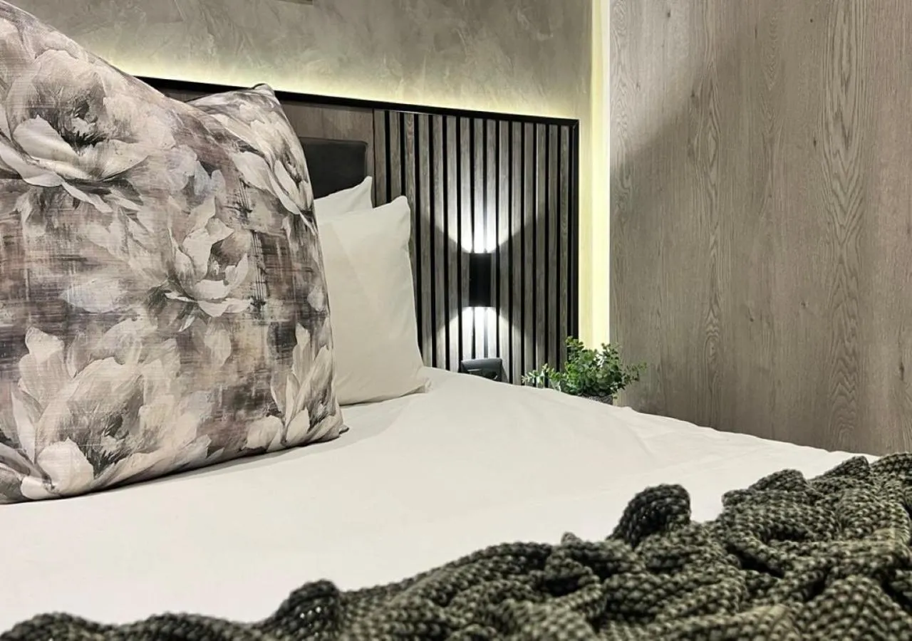 Bed in The Cycad Lodge & Chalets