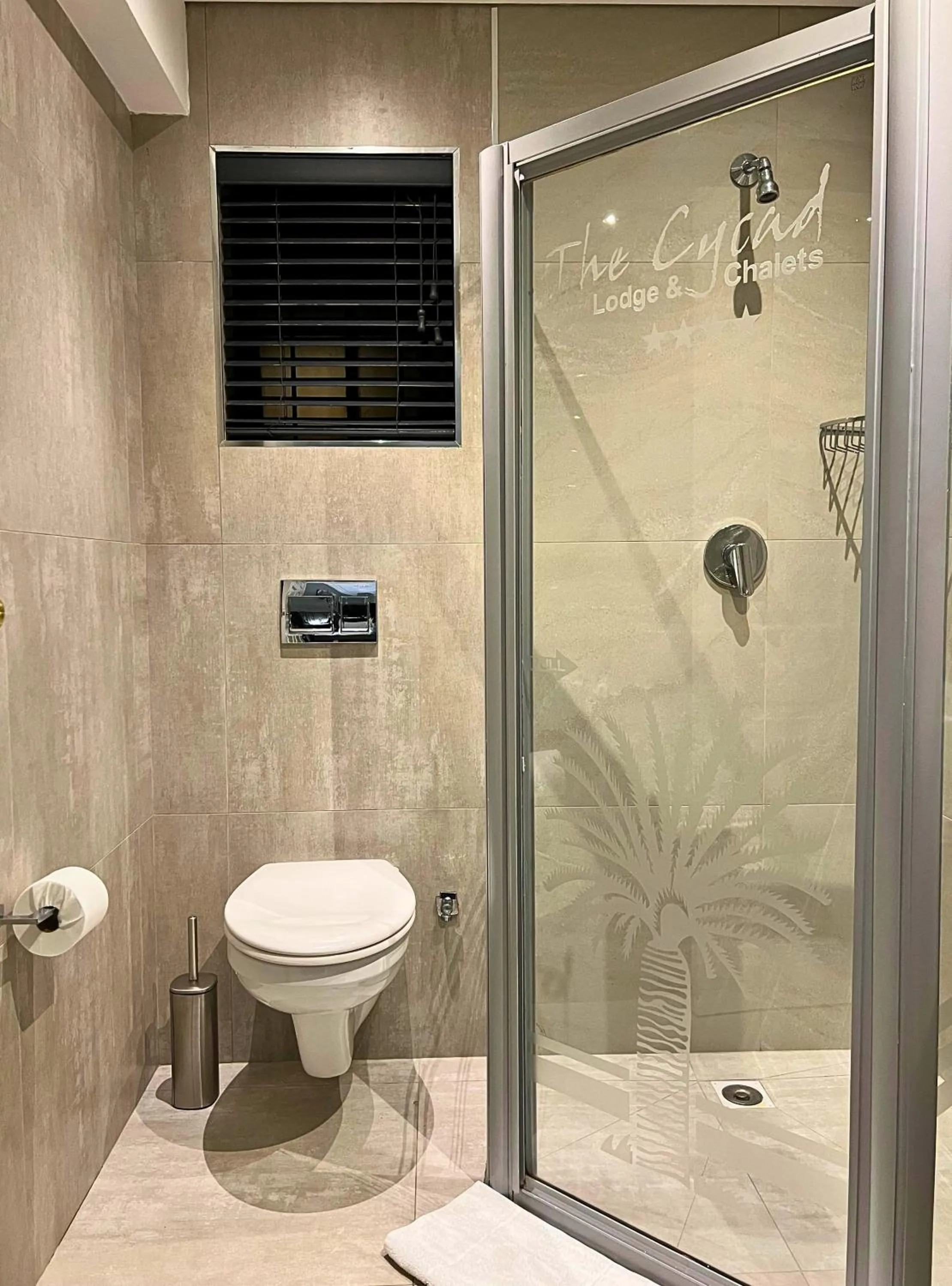 Bathroom in The Cycad Lodge & Chalets