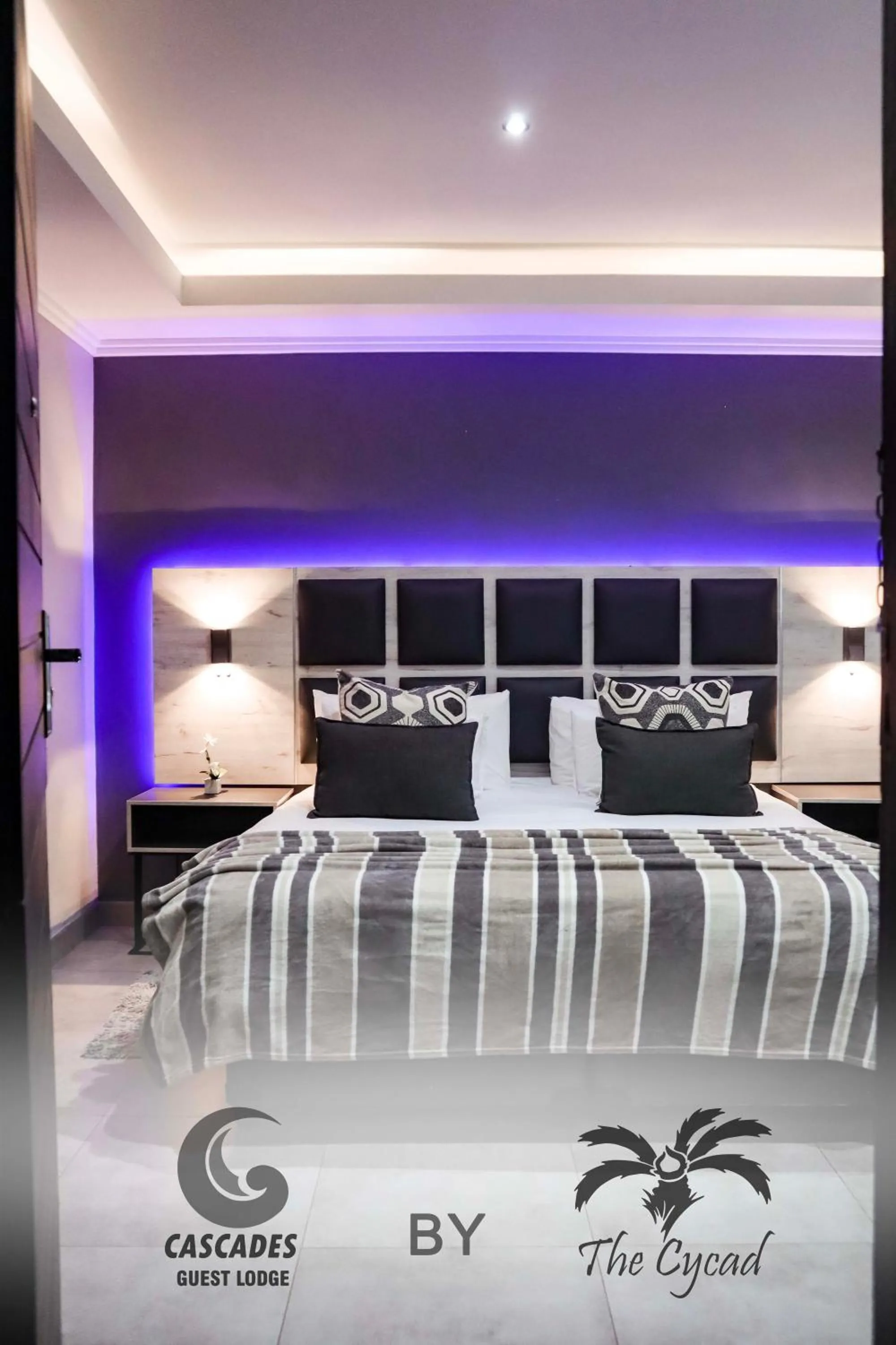 Bed in The Cycad Lodge & Chalets